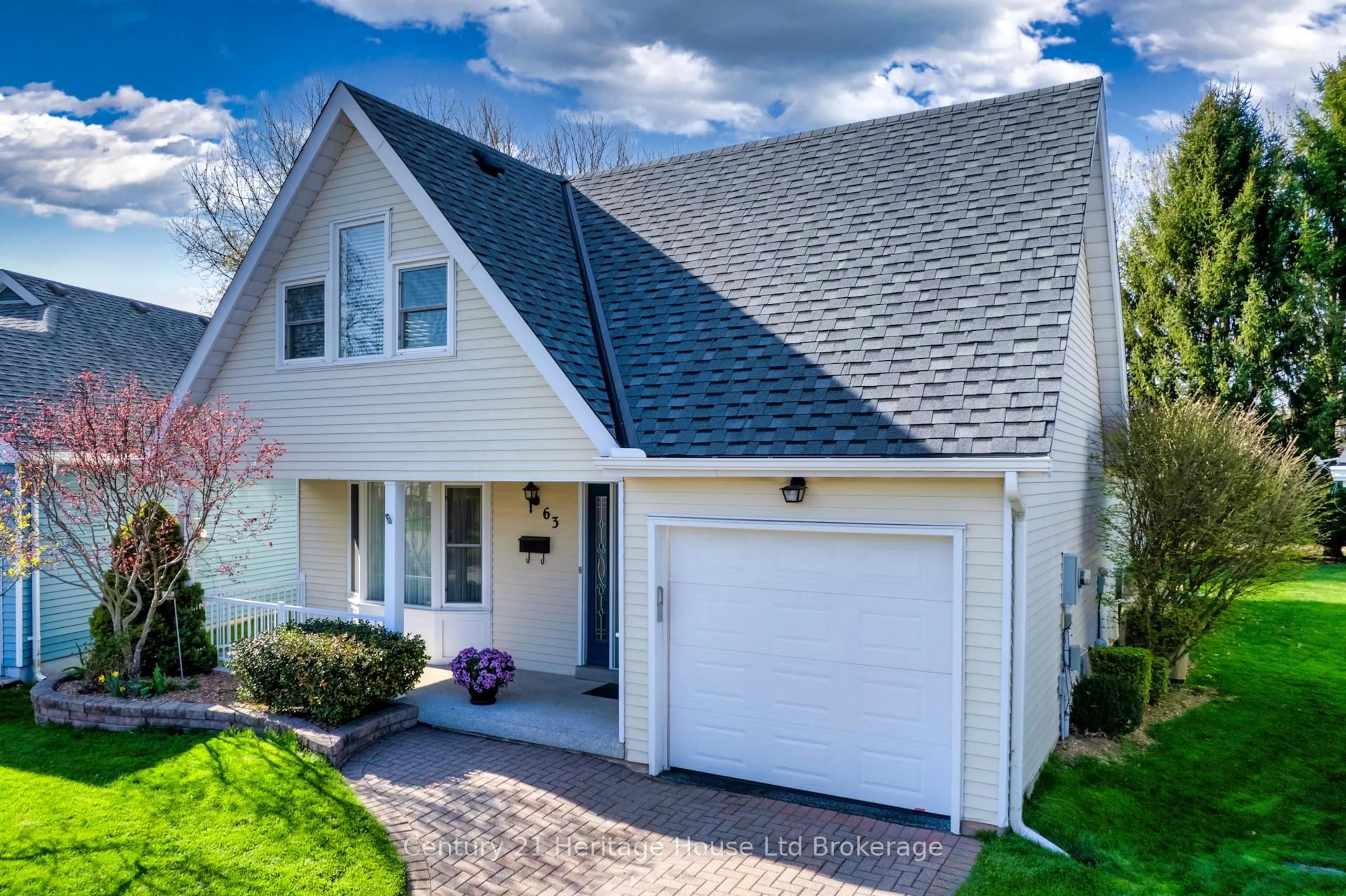 Home with vinyl exterior material, street for 63 Hawkins Cres, Tillsonburg Ontario N4G 5K7