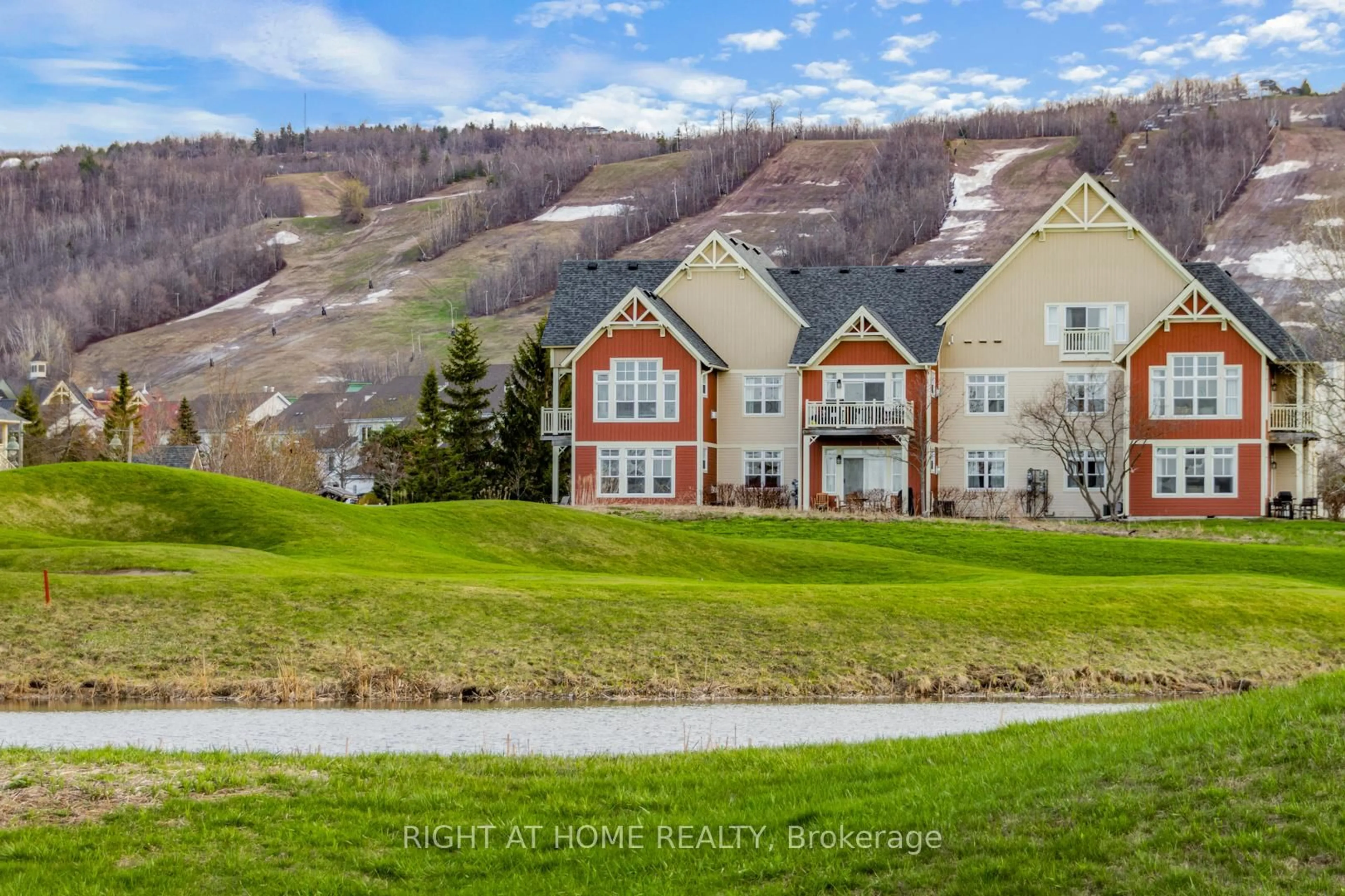 A pic from outside/outdoor area/front of a property/back of a property/a pic from drone, water/lake/river/ocean view for 130 Fairway Crt #229, Blue Mountains Ontario N3W 1Y1