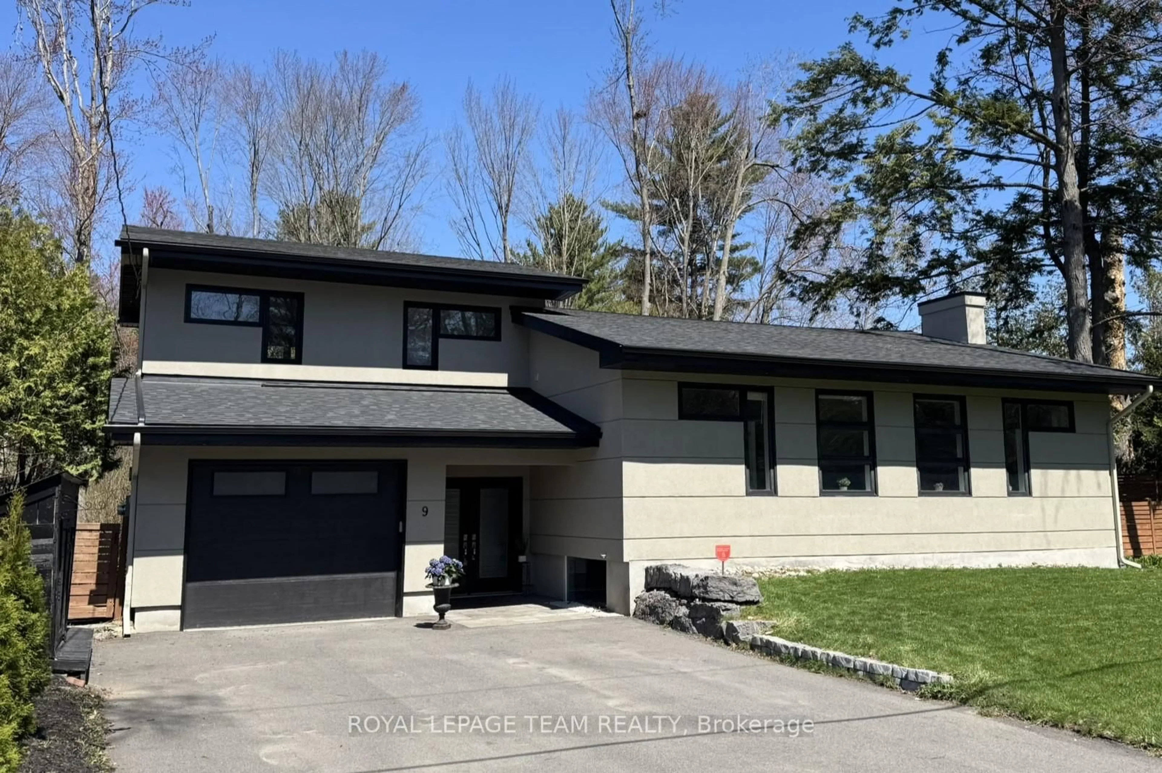 Home with vinyl exterior material, street for 9 Burnbank St, Ottawa Ontario K2G 0H2
