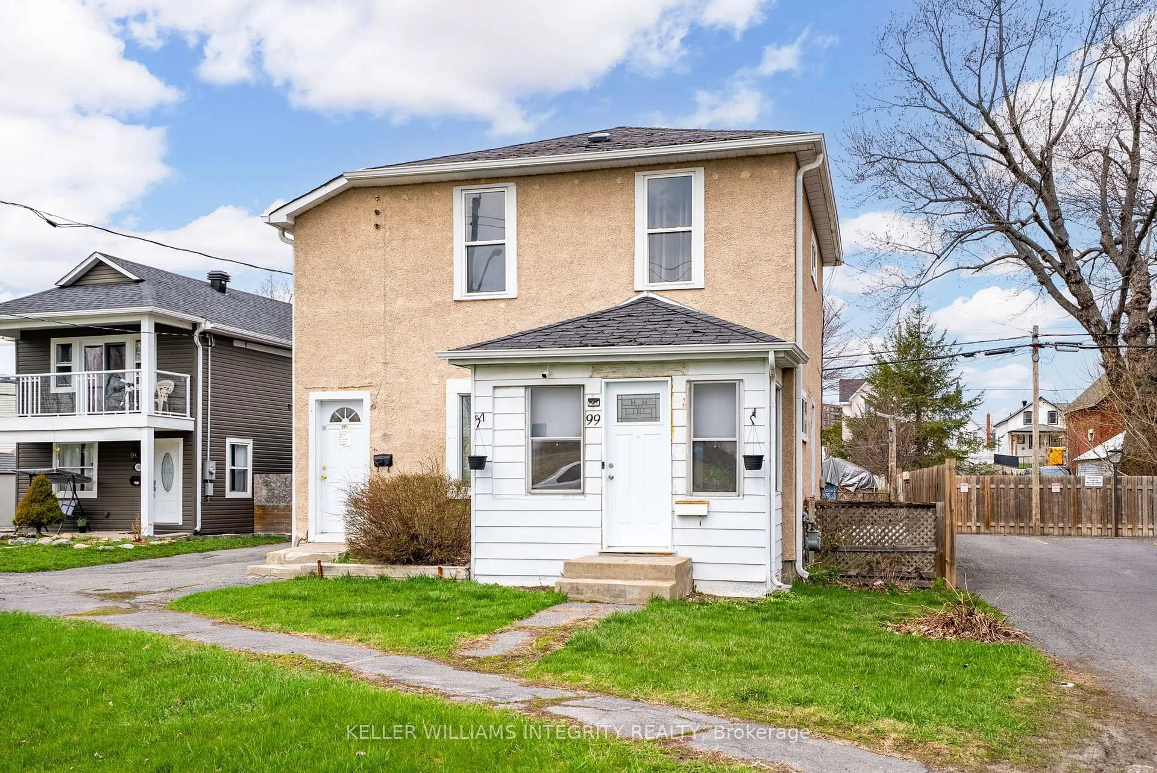 Home with vinyl exterior material, street for 99 & 99 1/2 Race St, Cornwall Ontario K6H 1G7