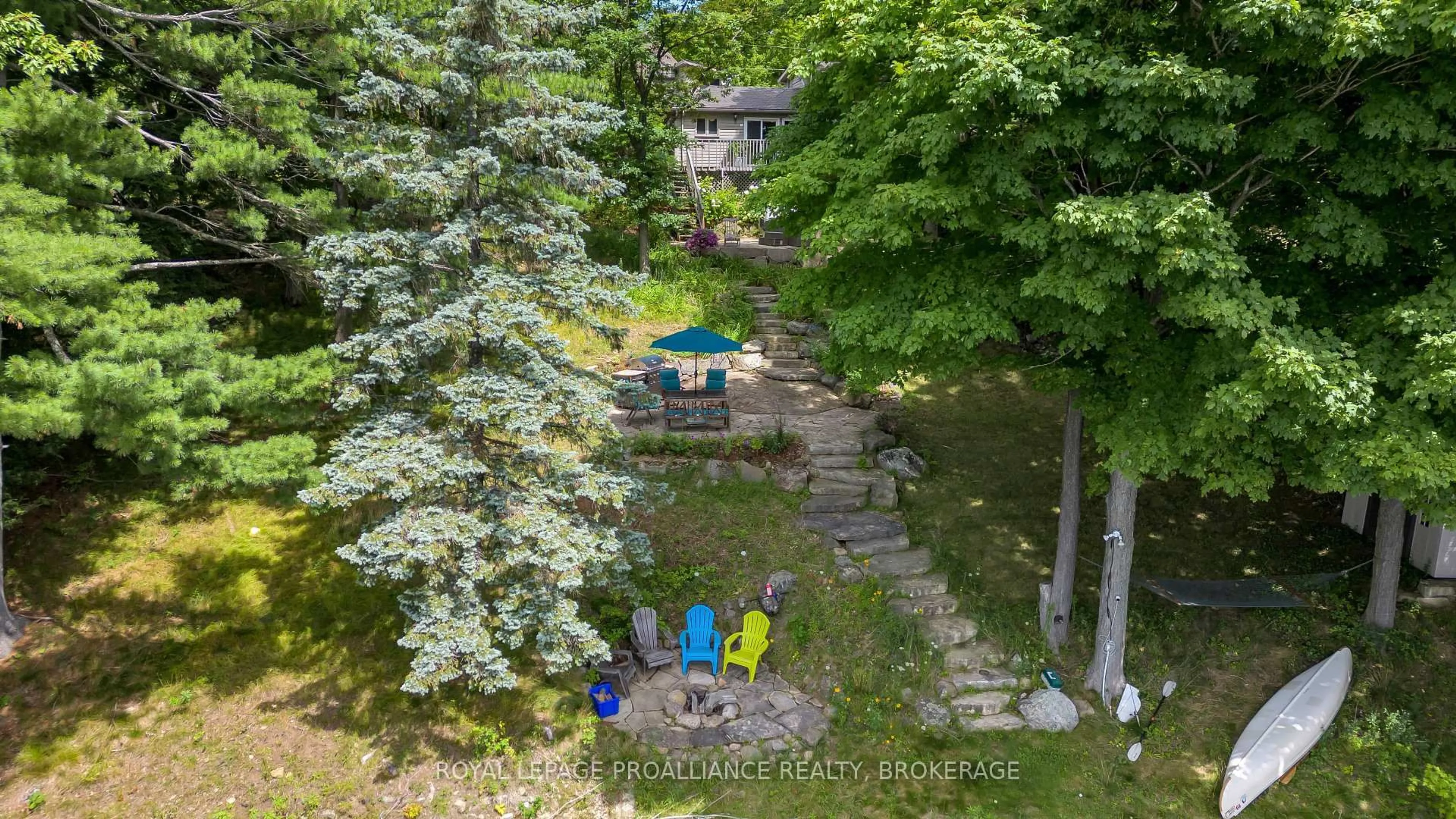 A pic from outside/outdoor area/front of a property/back of a property/a pic from drone, water/lake/river/ocean view for 18 Hickory Lane, Perth Road Ontario K0H 2L0