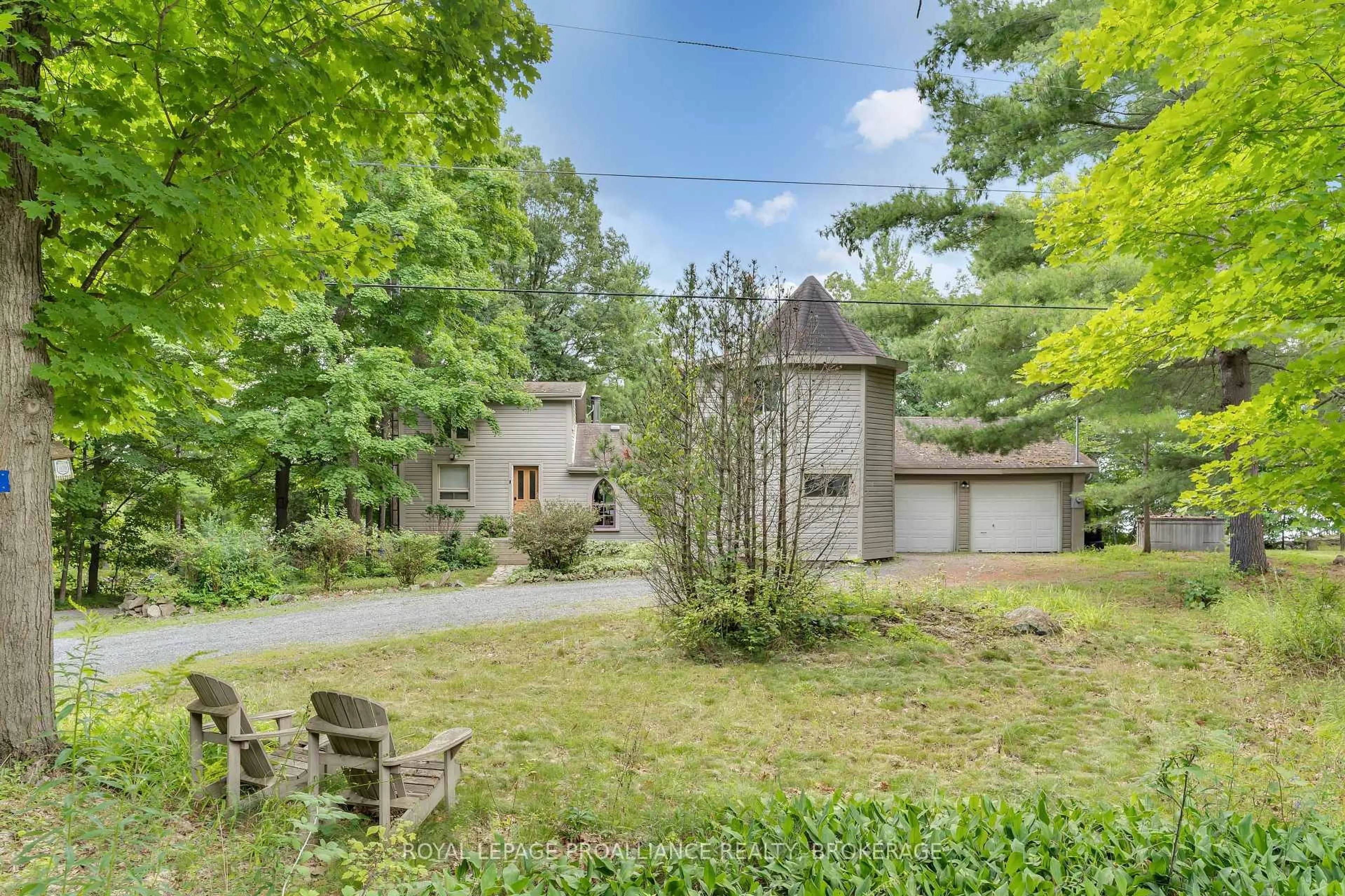 A pic from outside/outdoor area/front of a property/back of a property/a pic from drone, forest/trees view for 18 Hickory Lane, Perth Road Ontario K0H 2L0