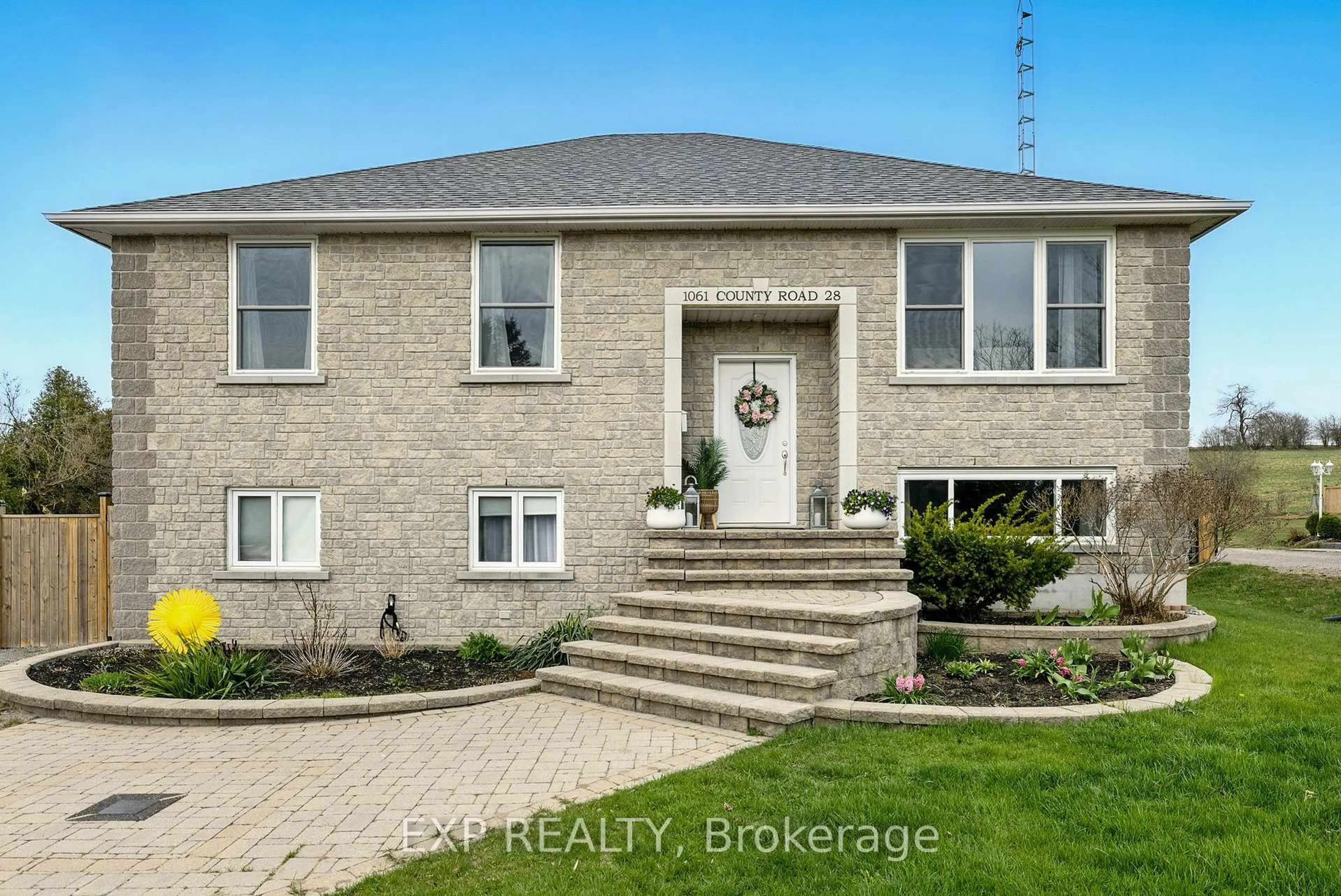 Home with brick exterior material, street for 1061 County 28 Rd, Otonabee-South Monaghan Ontario K0L 1V0