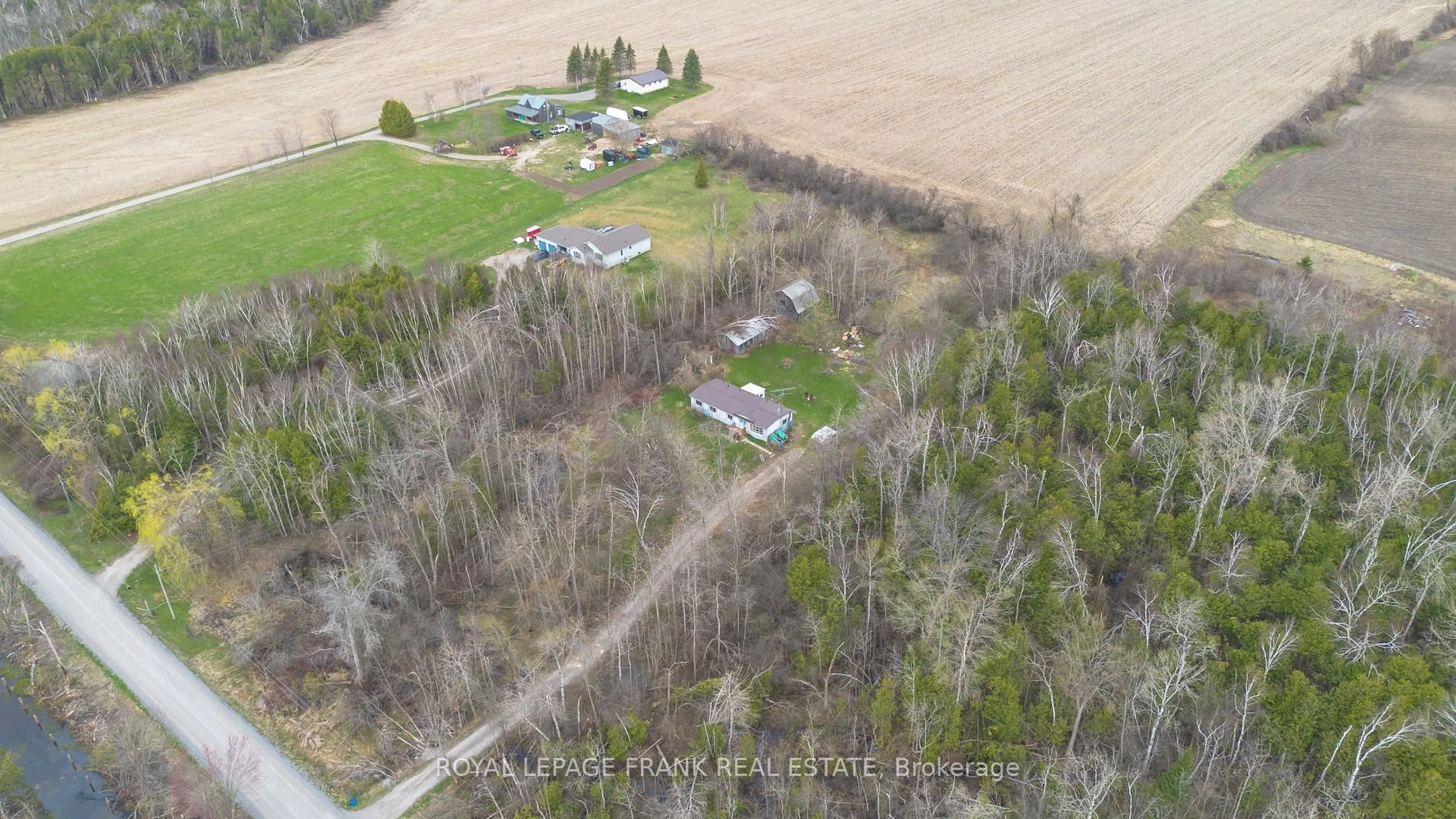 A pic from outside/outdoor area/front of a property/back of a property/a pic from drone, forest/trees view for 35 Elmtree Rd, Kawartha Lakes Ontario K0M 2C0
