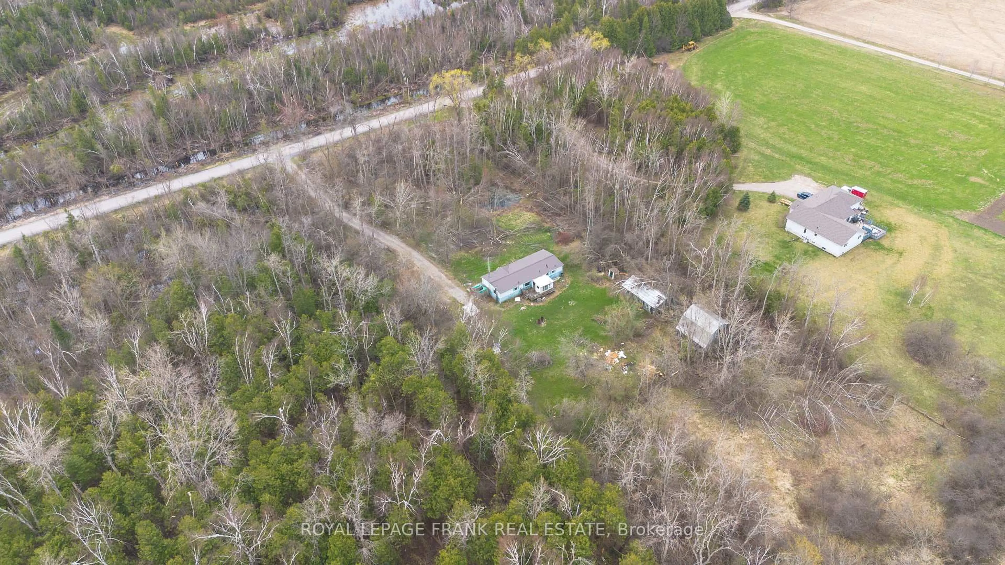 A pic from outside/outdoor area/front of a property/back of a property/a pic from drone, forest/trees view for 35 Elmtree Rd, Kawartha Lakes Ontario K0M 2C0