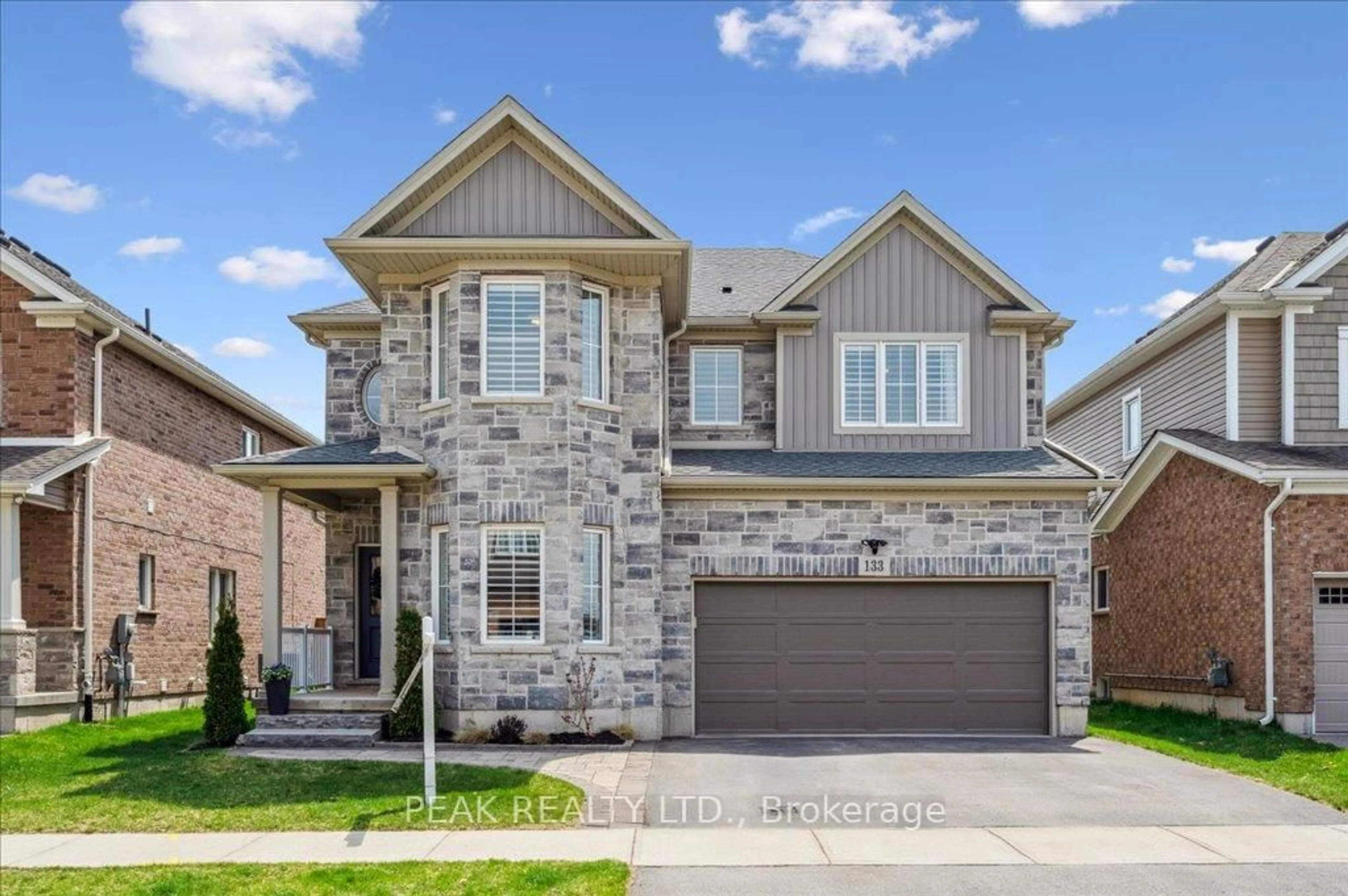 Home with brick exterior material, street for 133 Eaglecrest St, Kitchener Ontario N2K 0C4