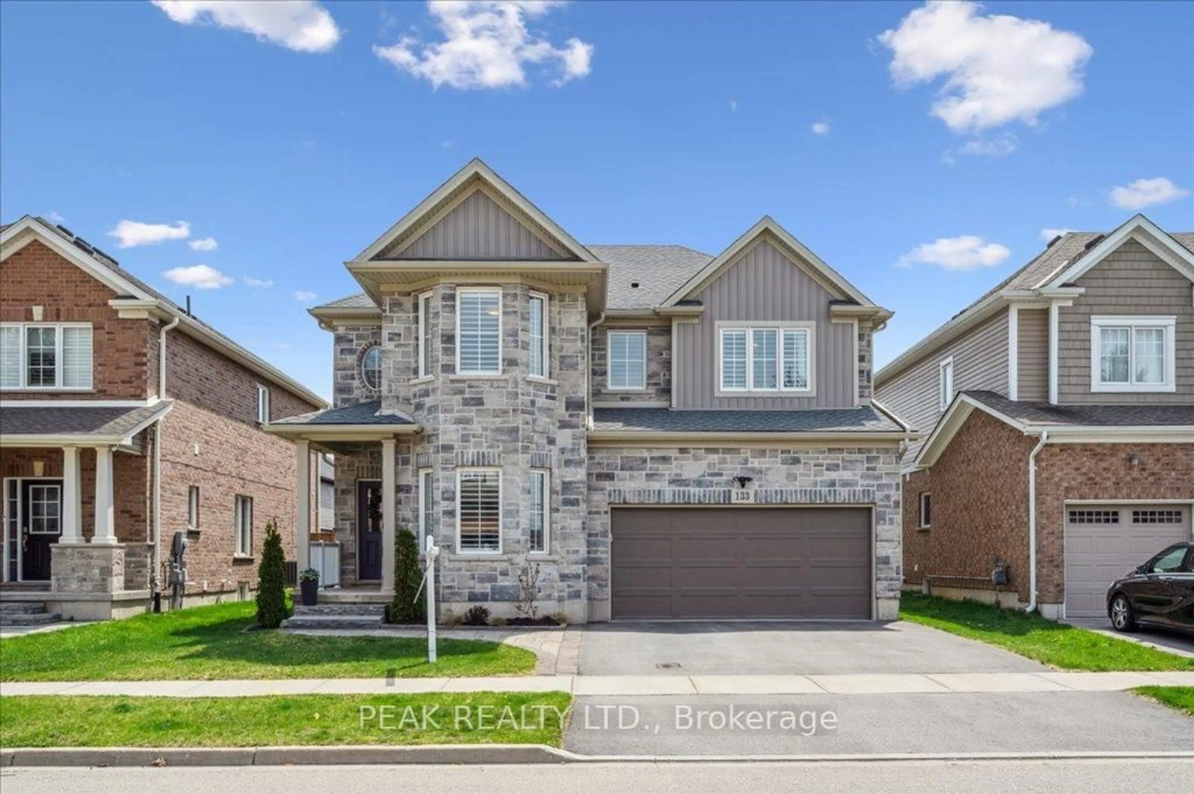 Home with brick exterior material, street for 133 Eaglecrest St, Kitchener Ontario N2K 0C4