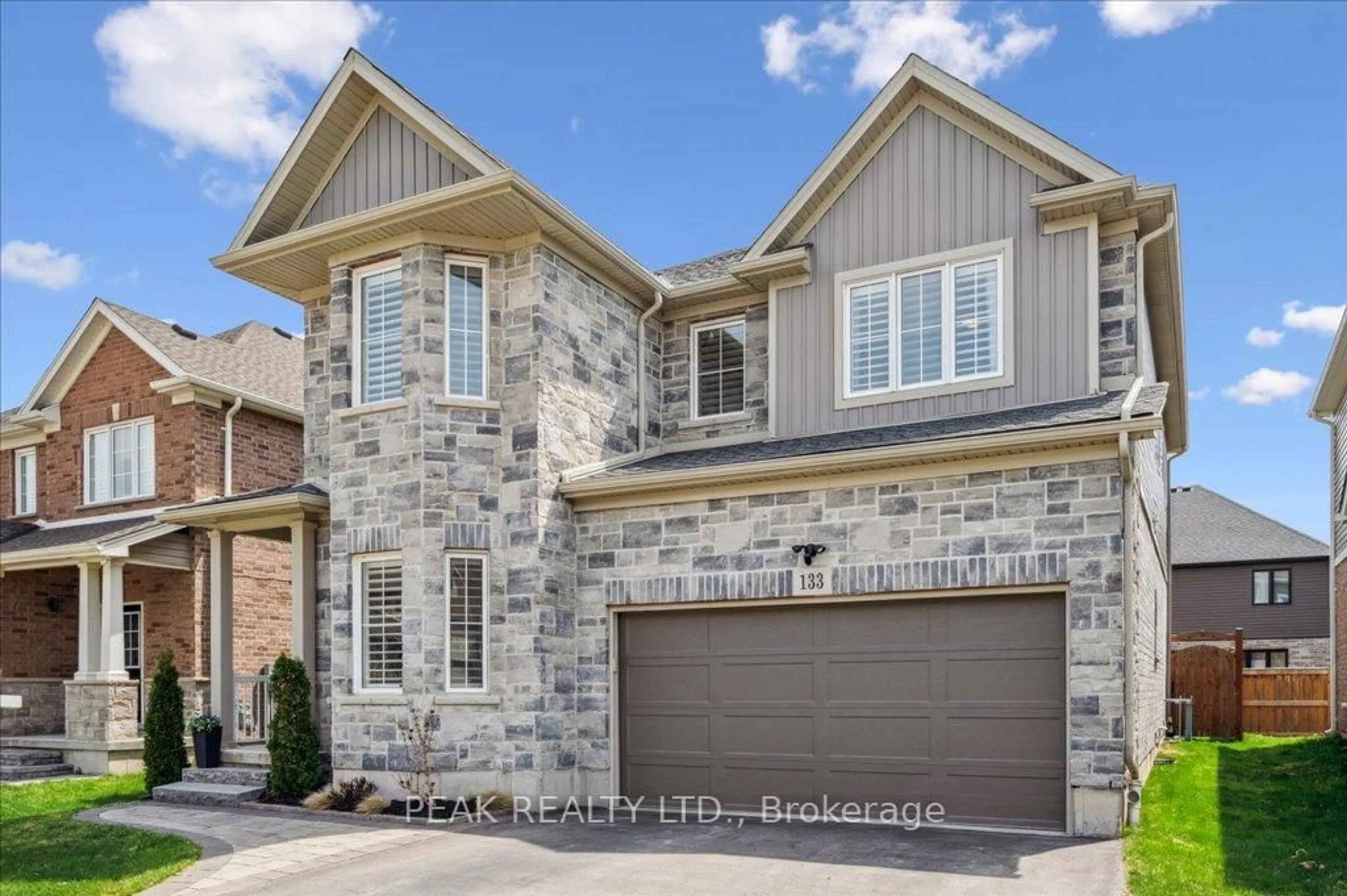 Home with brick exterior material, street for 133 Eaglecrest St, Kitchener Ontario N2K 0C4
