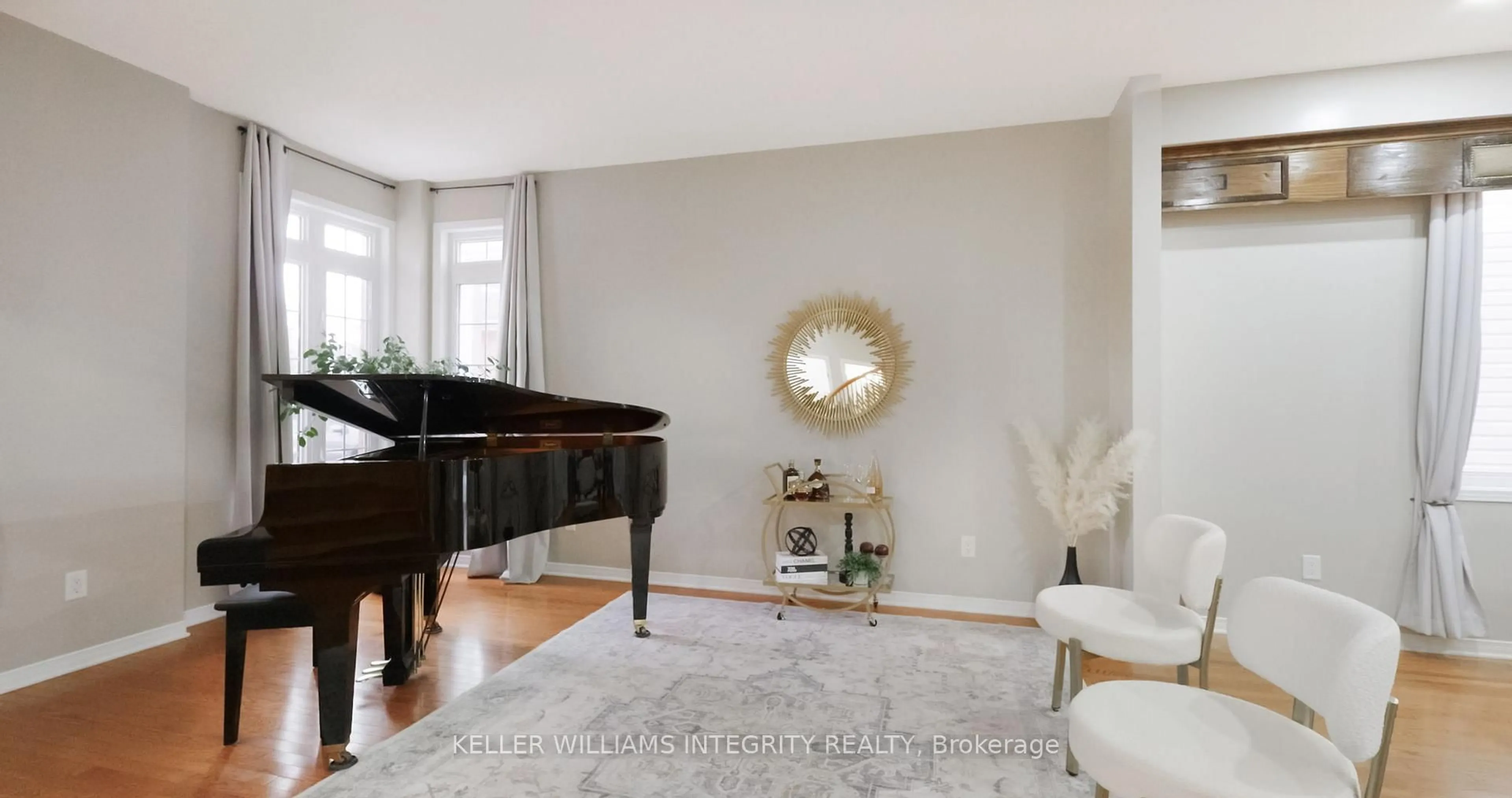Living room with furniture, wood/laminate floor for 2117 Valin St, Ottawa Ontario K4A 4T5