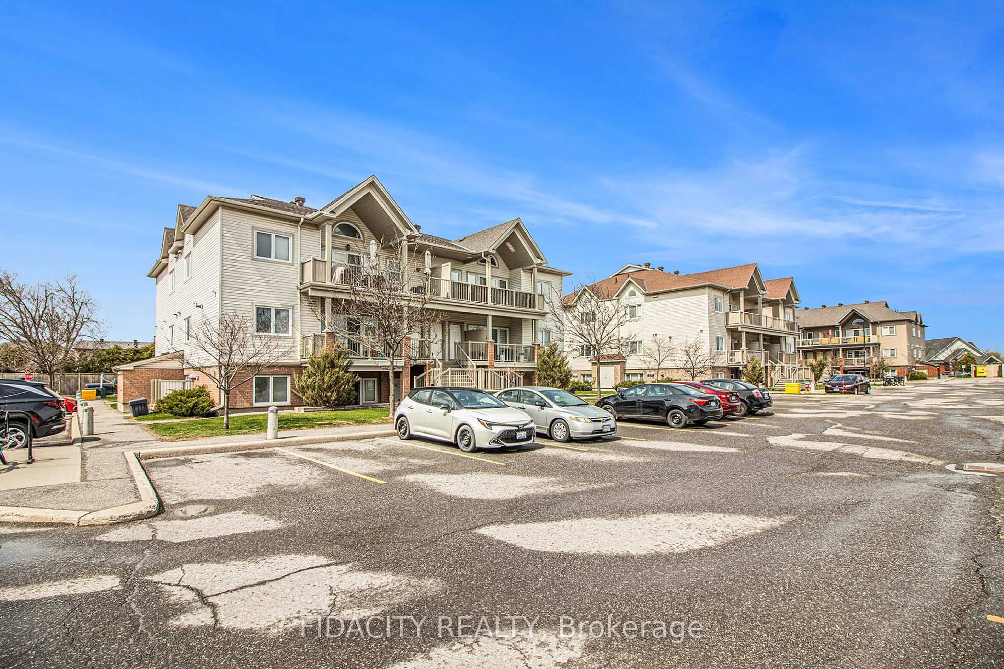 A pic from outside/outdoor area/front of a property/back of a property/a pic from drone, mountain view for 139 Harthill Way #K, Ottawa Ontario K2J 5V1