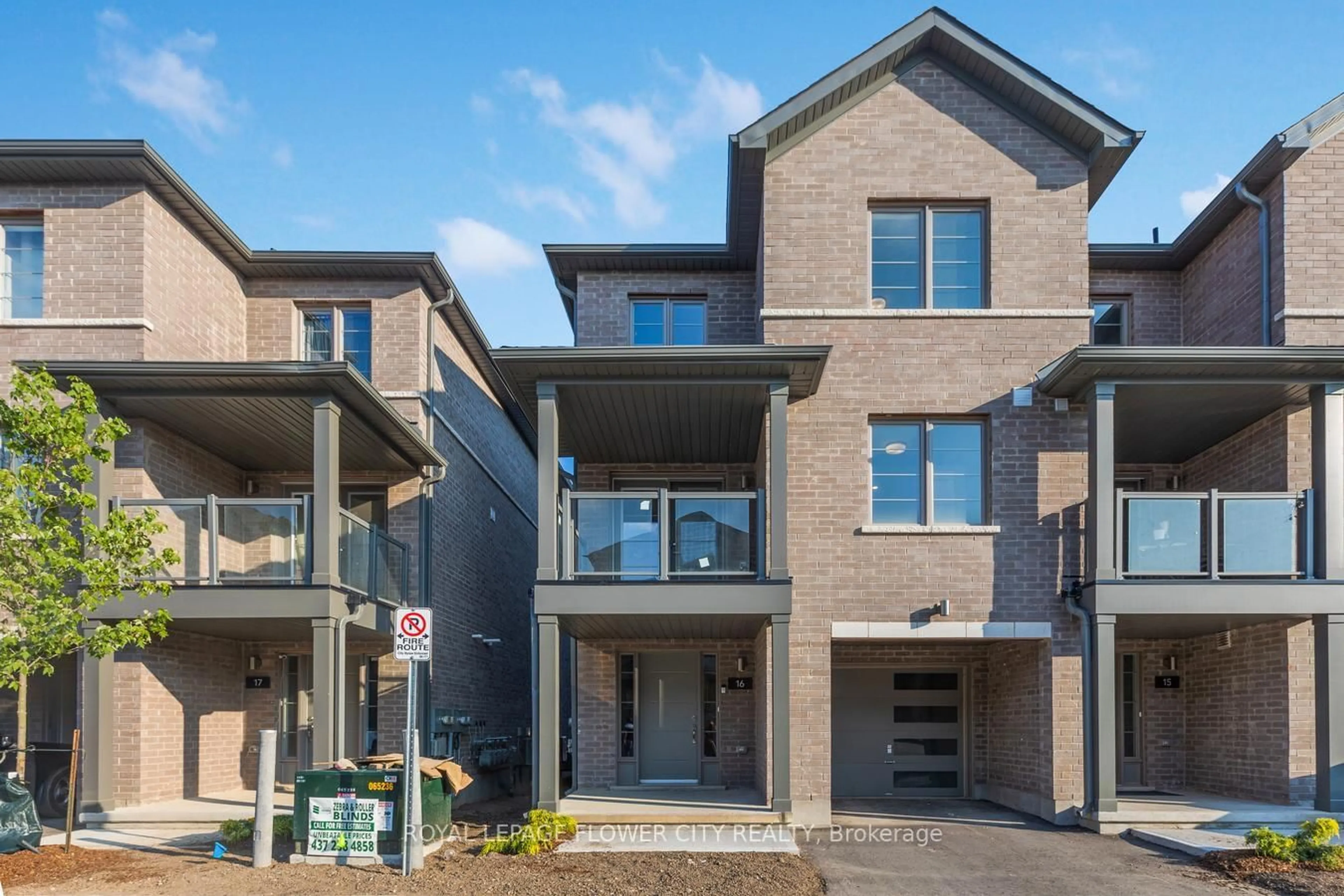 Home with brick exterior material, street for 205 West Oak Tr #16, Kitchener Ontario N2R 0R9