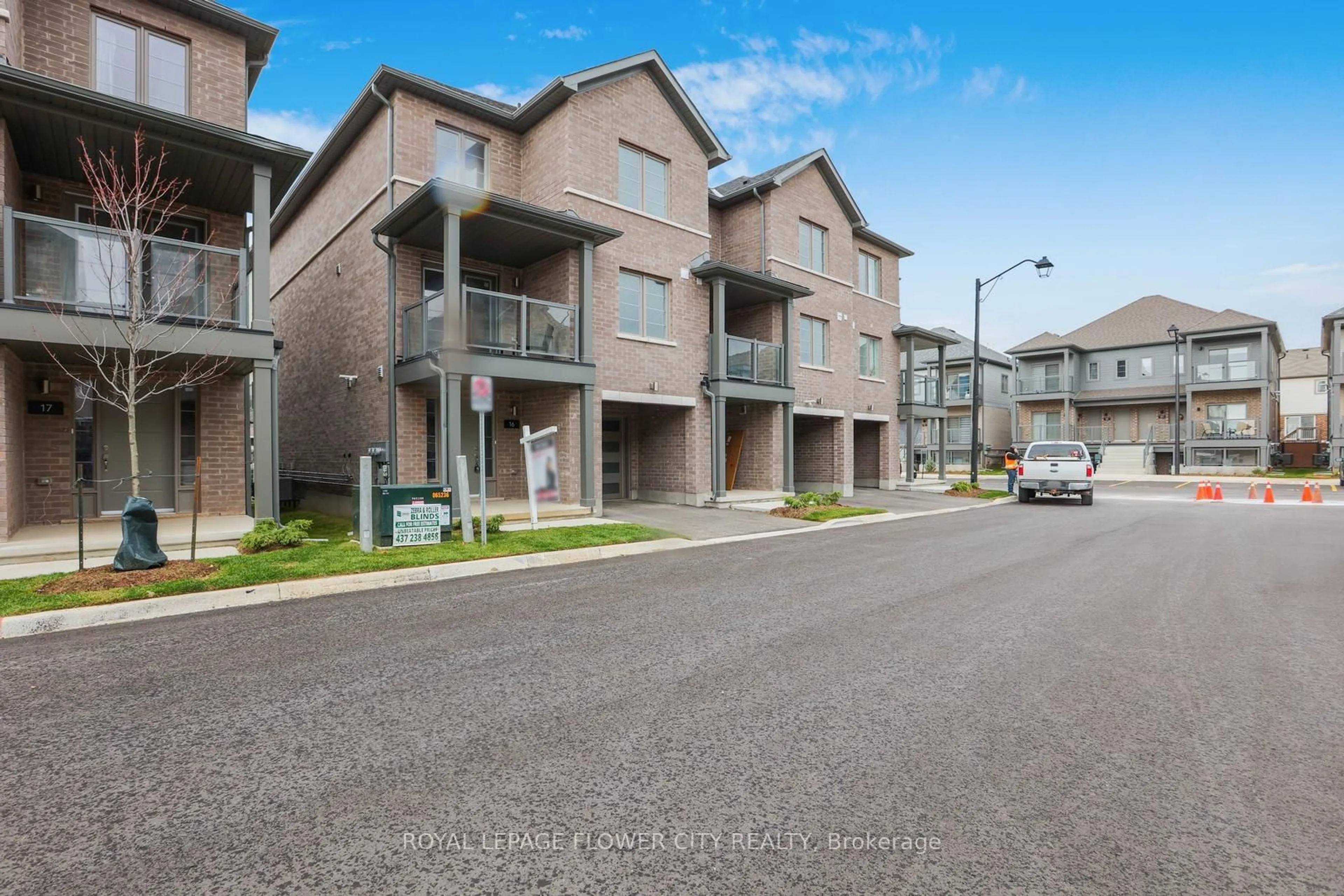 A pic from outside/outdoor area/front of a property/back of a property/a pic from drone, street for 205 West Oak Tr #16, Kitchener Ontario N2R 0R9