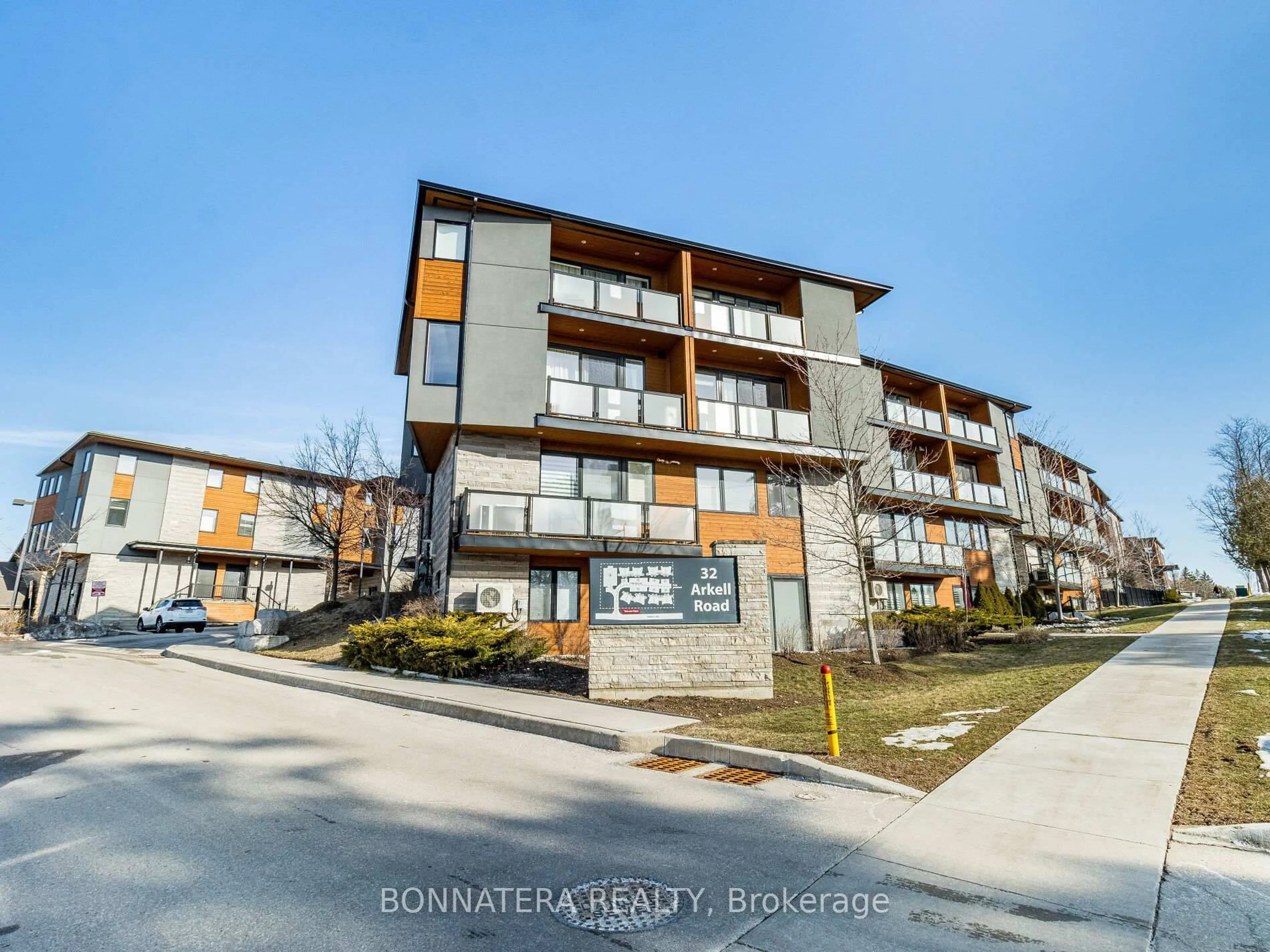 A pic from outside/outdoor area/front of a property/back of a property/a pic from drone, mountain view for 32 ARKELL Rd #7, Guelph Ontario N1G 5E7
