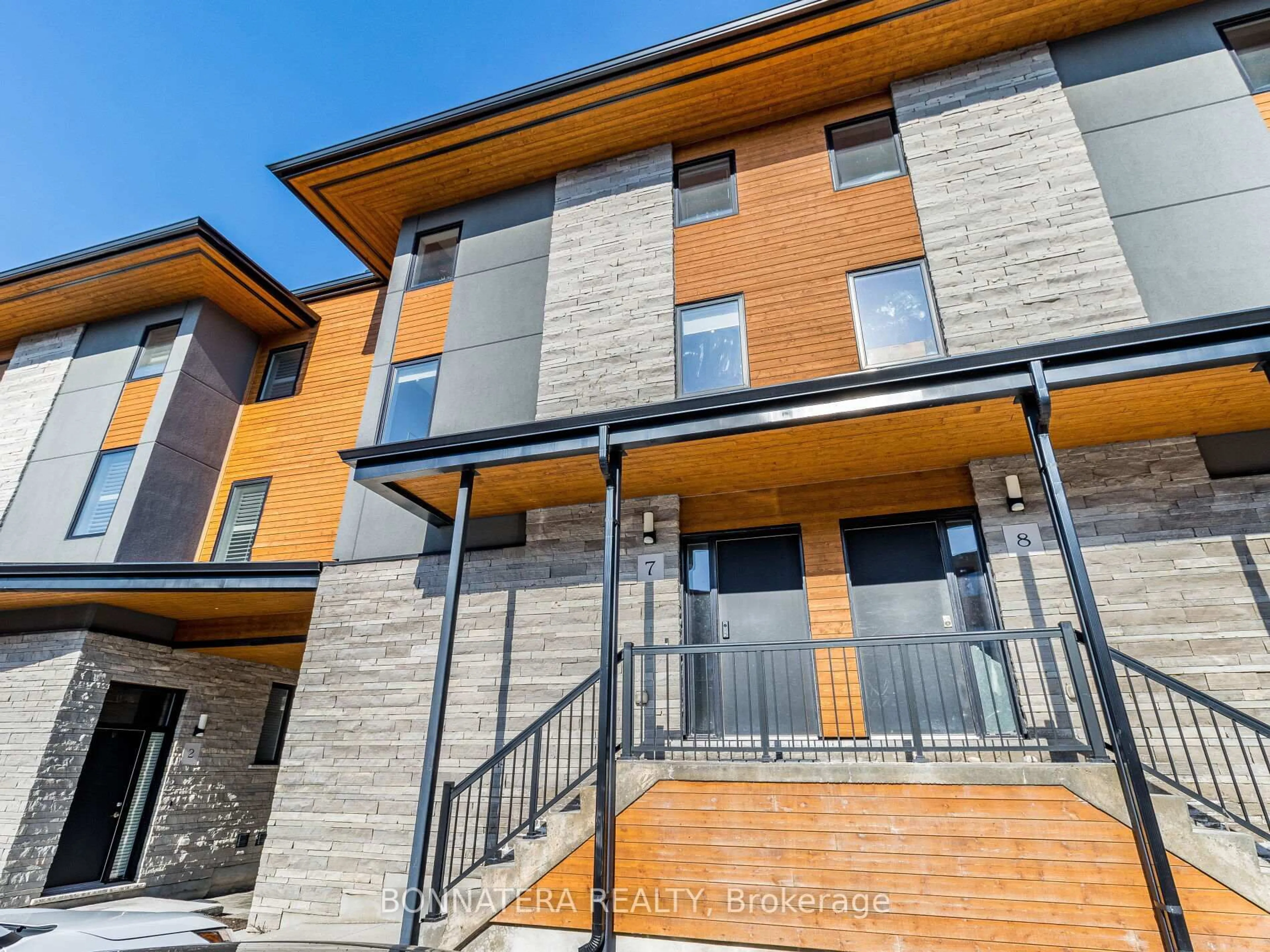 Home with brick exterior material, building for 32 ARKELL Rd #7, Guelph Ontario N1G 5E7