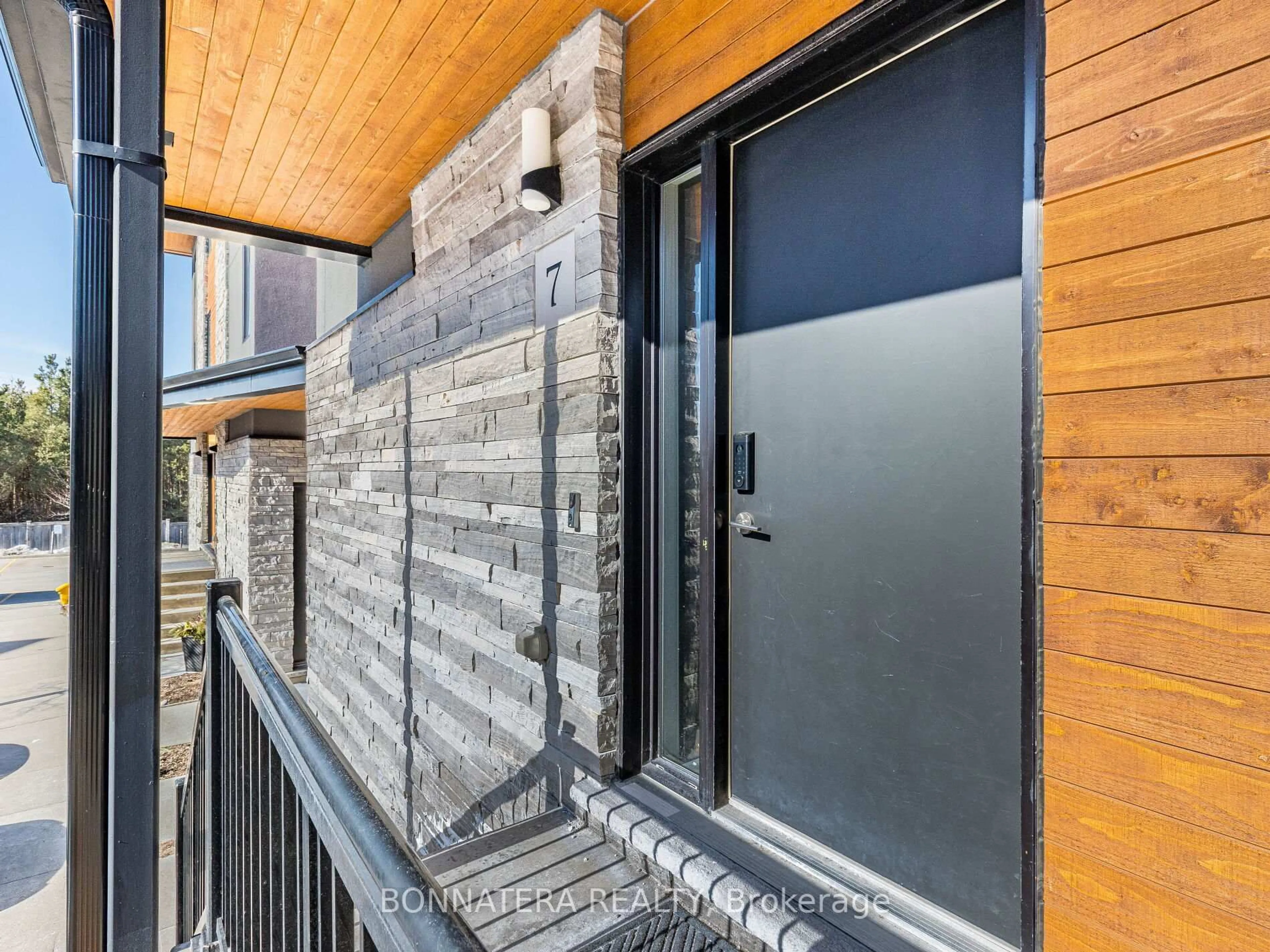 Home with brick exterior material, street for 32 ARKELL Rd #7, Guelph Ontario N1G 5E7