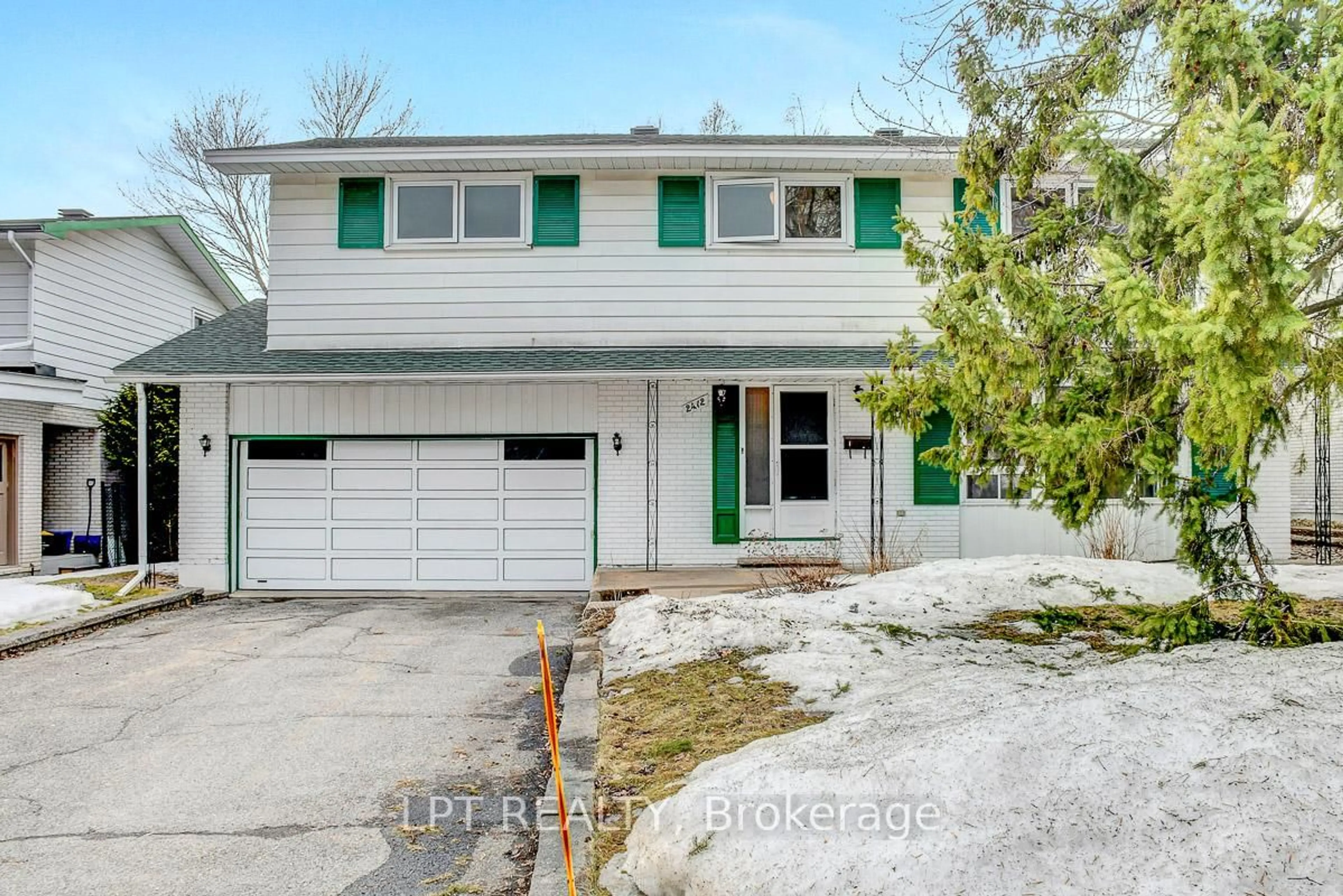 Home with vinyl exterior material, street for 2412 Rosewood Ave, Ottawa Ontario K2B 7L4