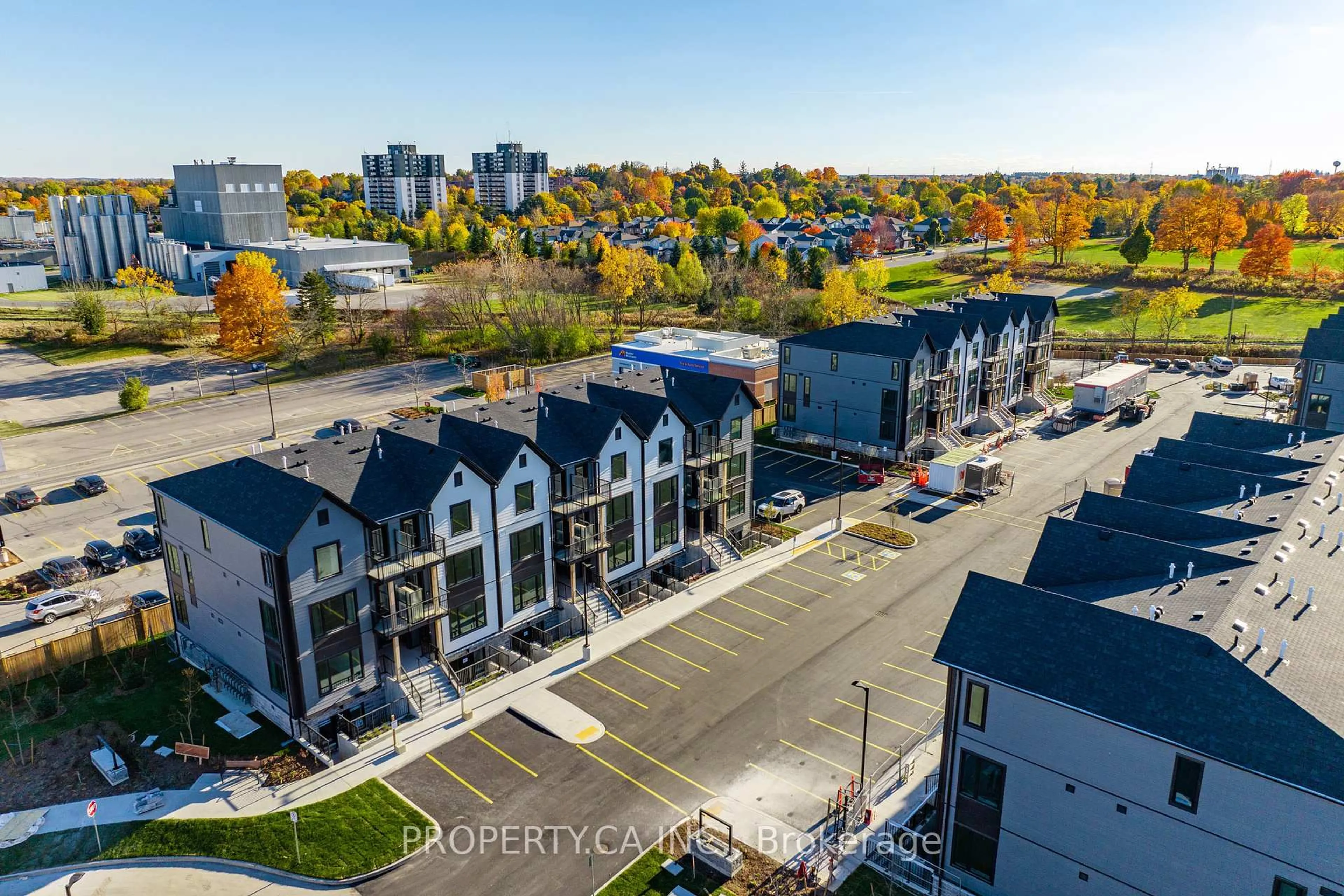 A pic from outside/outdoor area/front of a property/back of a property/a pic from drone, unknown for 708 Woolwich St #113, Guelph Ontario N1H 7G6
