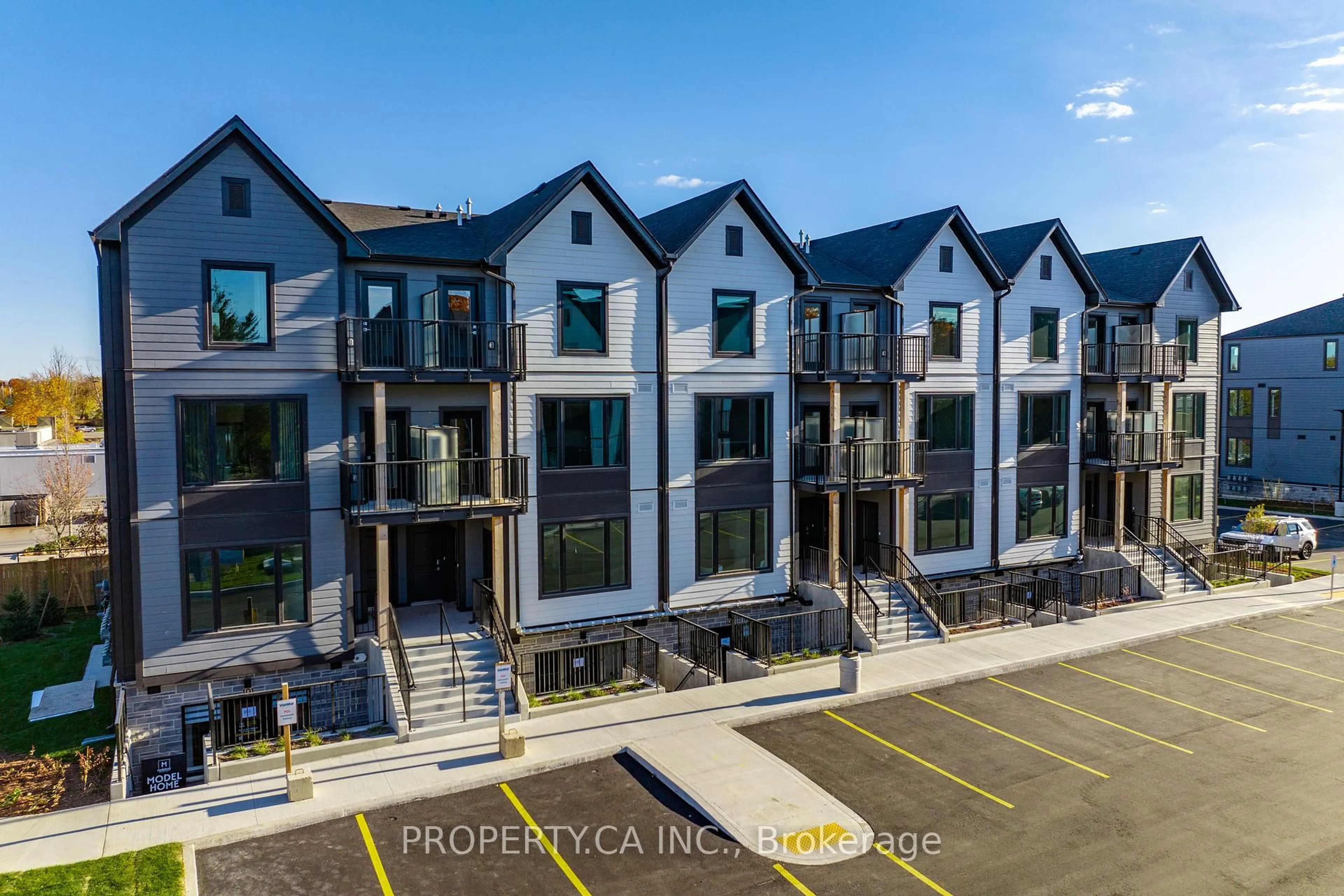 A pic from outside/outdoor area/front of a property/back of a property/a pic from drone, unknown for 708 Woolwich St #113, Guelph Ontario N1H 7G6