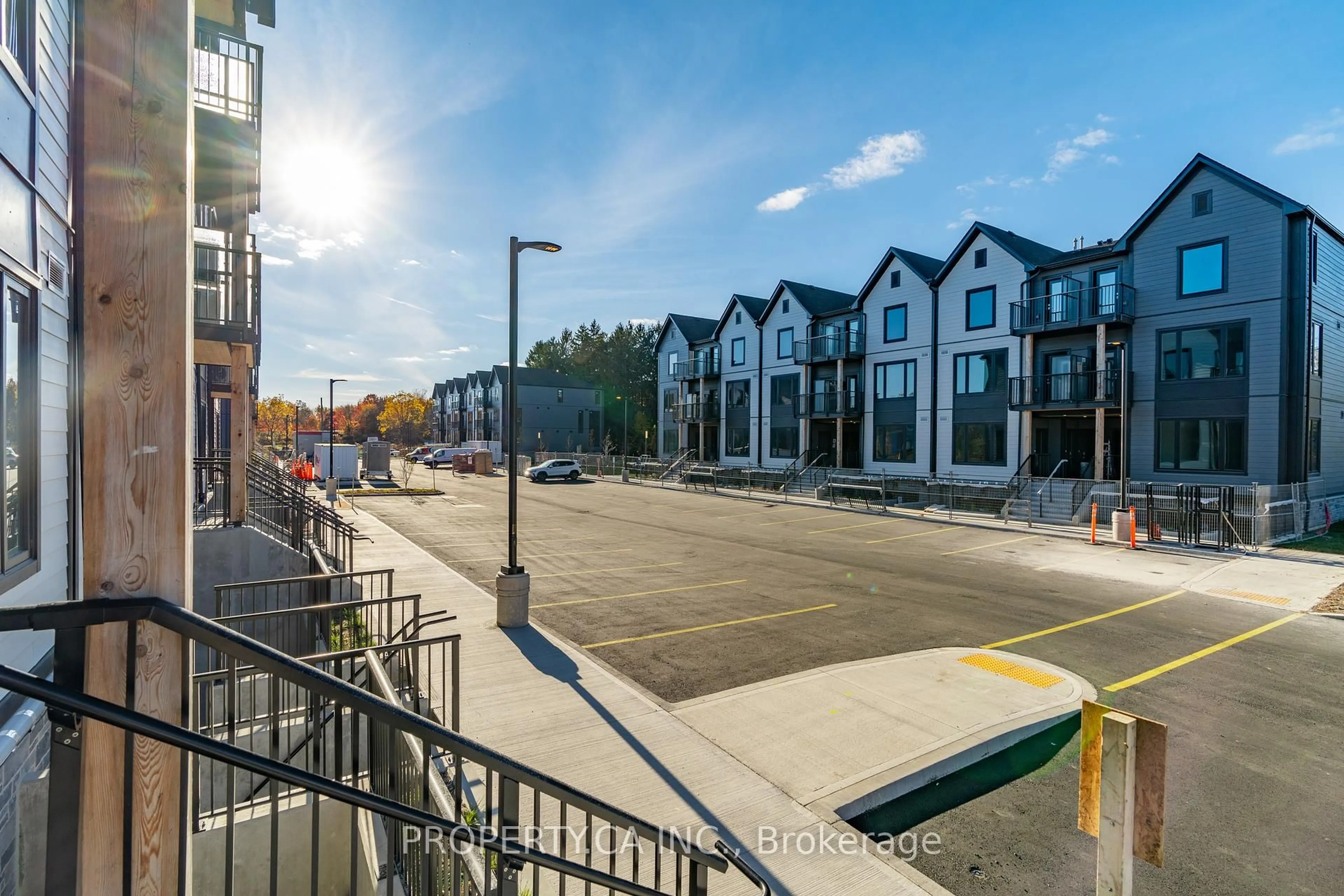 A pic from outside/outdoor area/front of a property/back of a property/a pic from drone, street for 708 Woolwich St #113, Guelph Ontario N1H 7G6