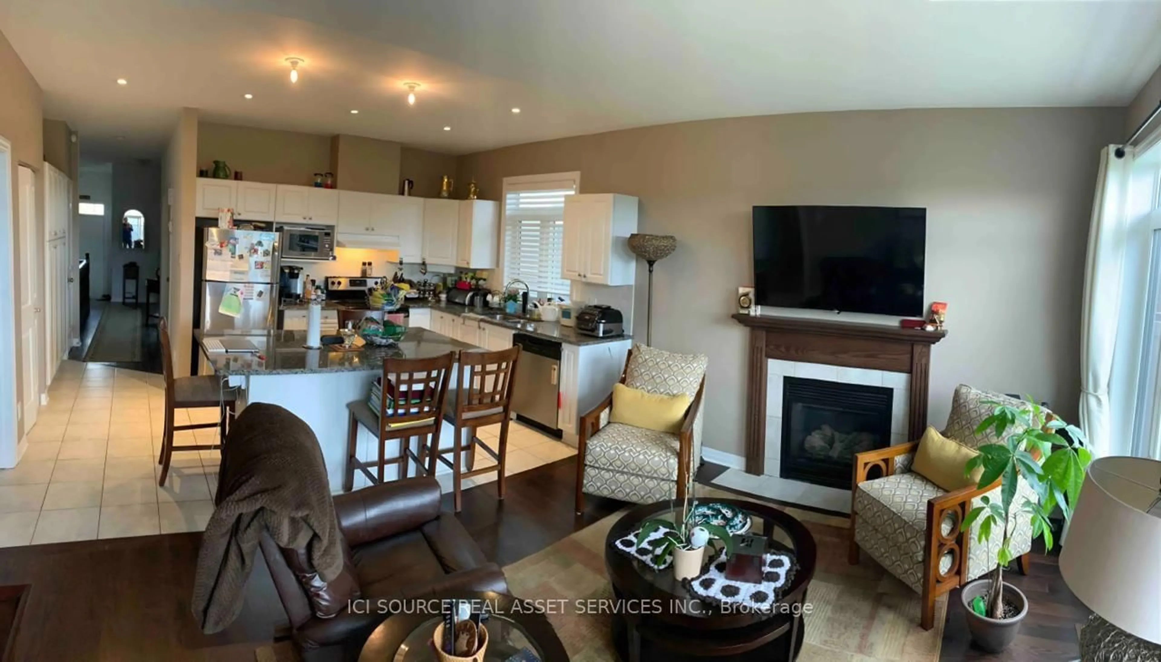 Open concept kitchen, wood/laminate floor for 388 Bamburgh Way, Ottawa Ontario K2J 6A6