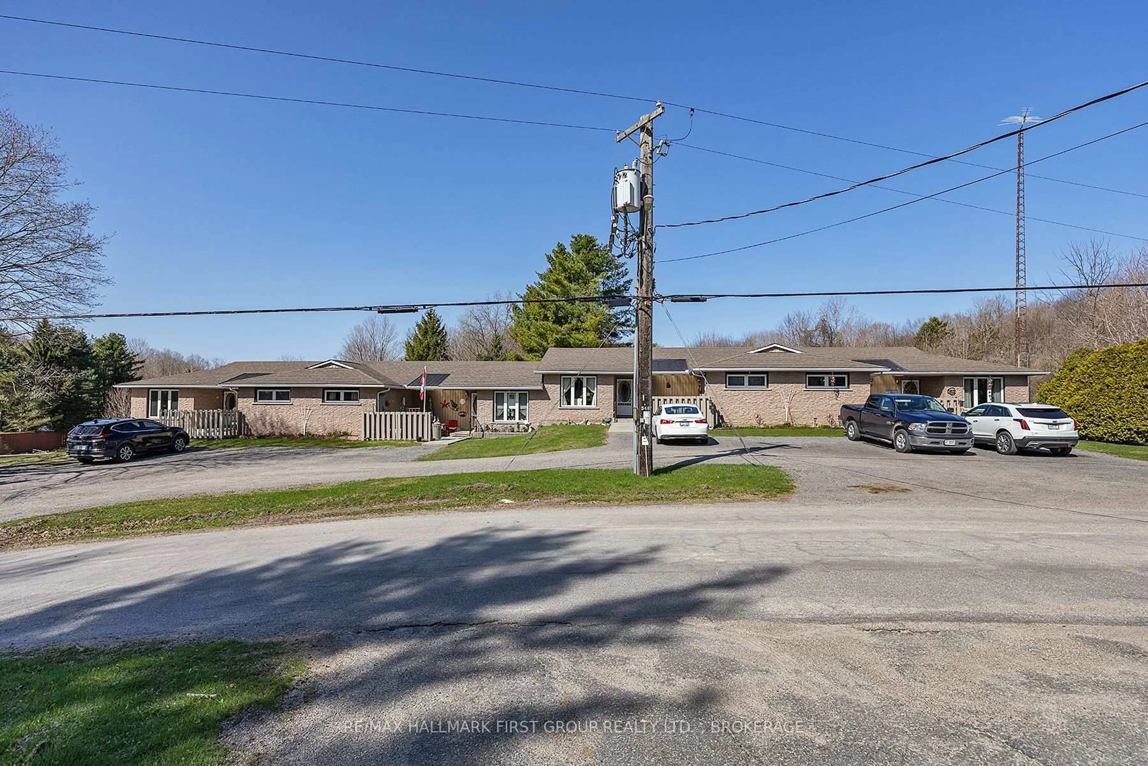 A pic from outside/outdoor area/front of a property/back of a property/a pic from drone, street for 128 Haskins Point Rd #1-5, Leeds and the Thousand Islands Ontario K0H 2N0