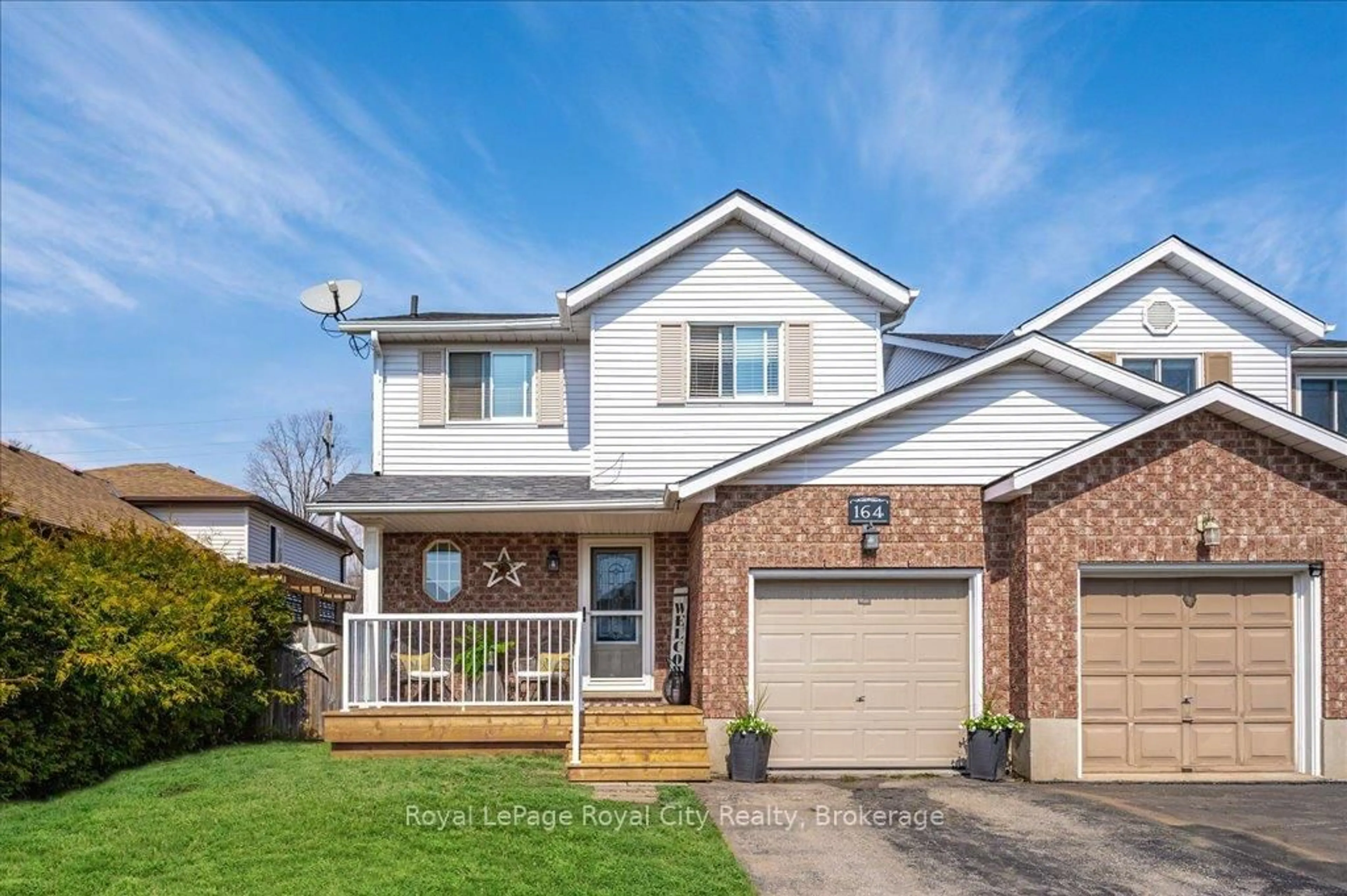 Home with brick exterior material, street for 164 Tait Cres, Centre Wellington Ontario N1M 3P5