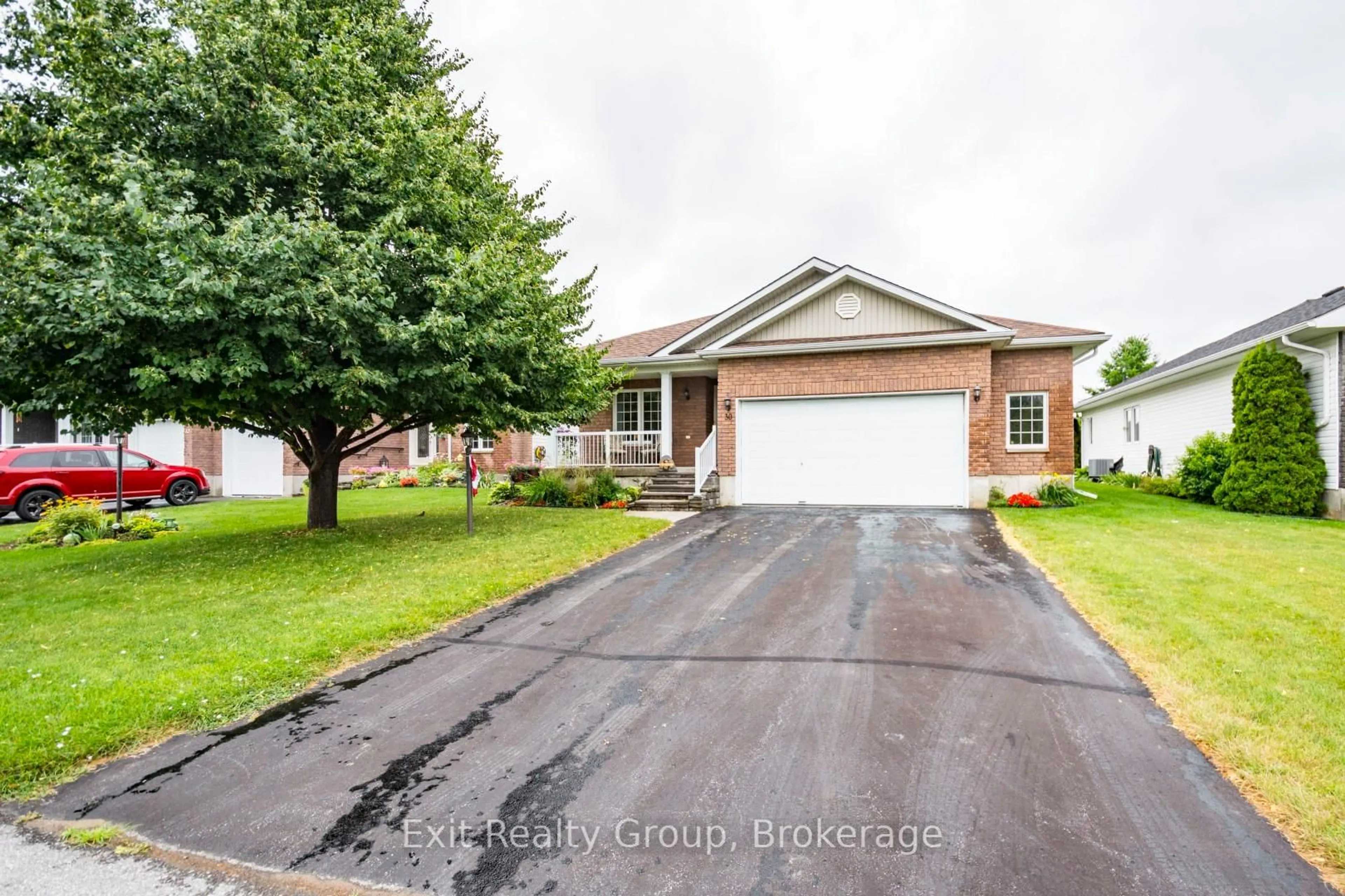 Home with brick exterior material, street for 30 Aletha Dr, Prince Edward County Ontario K0K 3L0