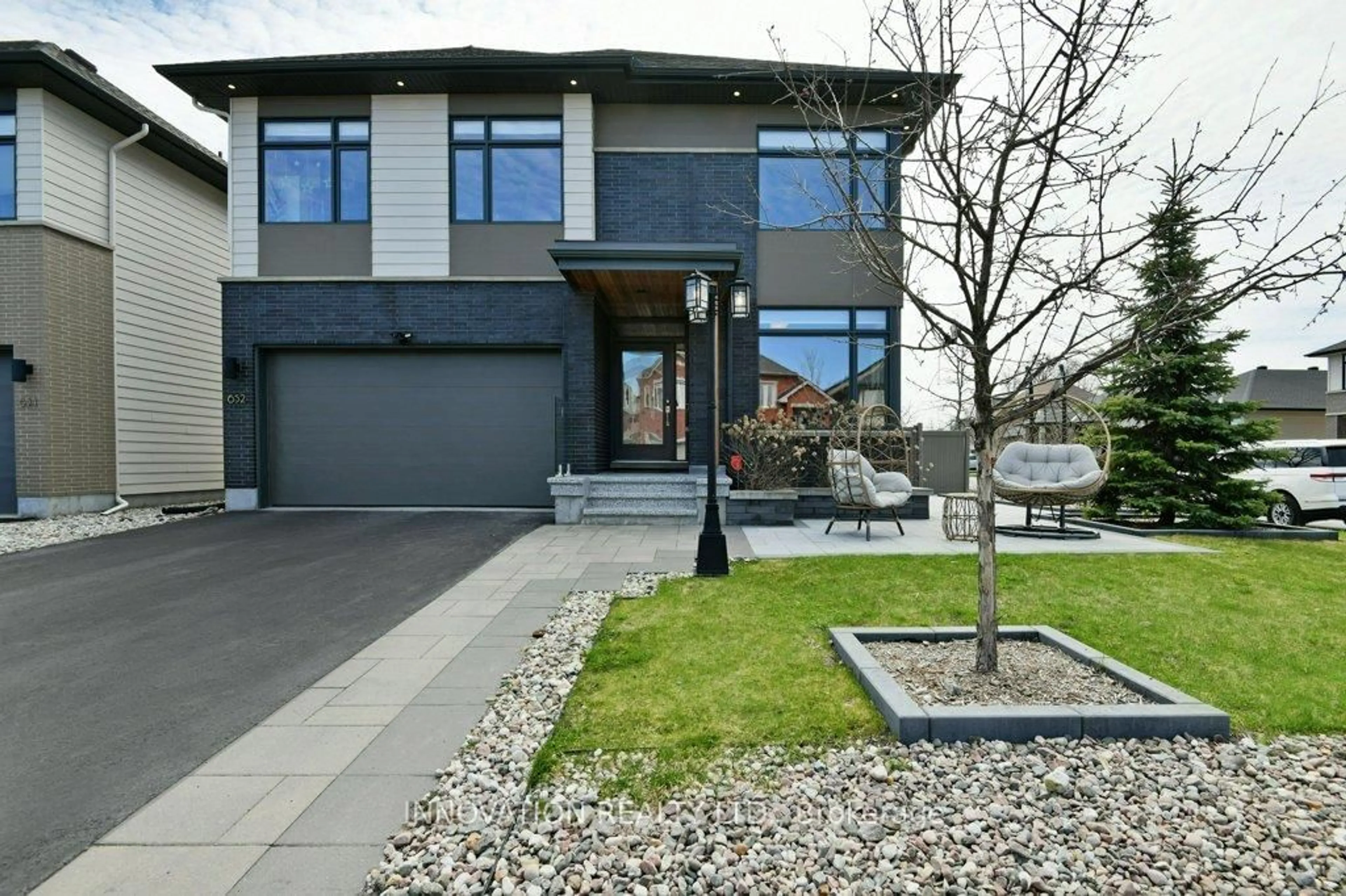 Home with brick exterior material, street for 652 Bridleglen Cres, Ottawa Ontario K2M 0H2
