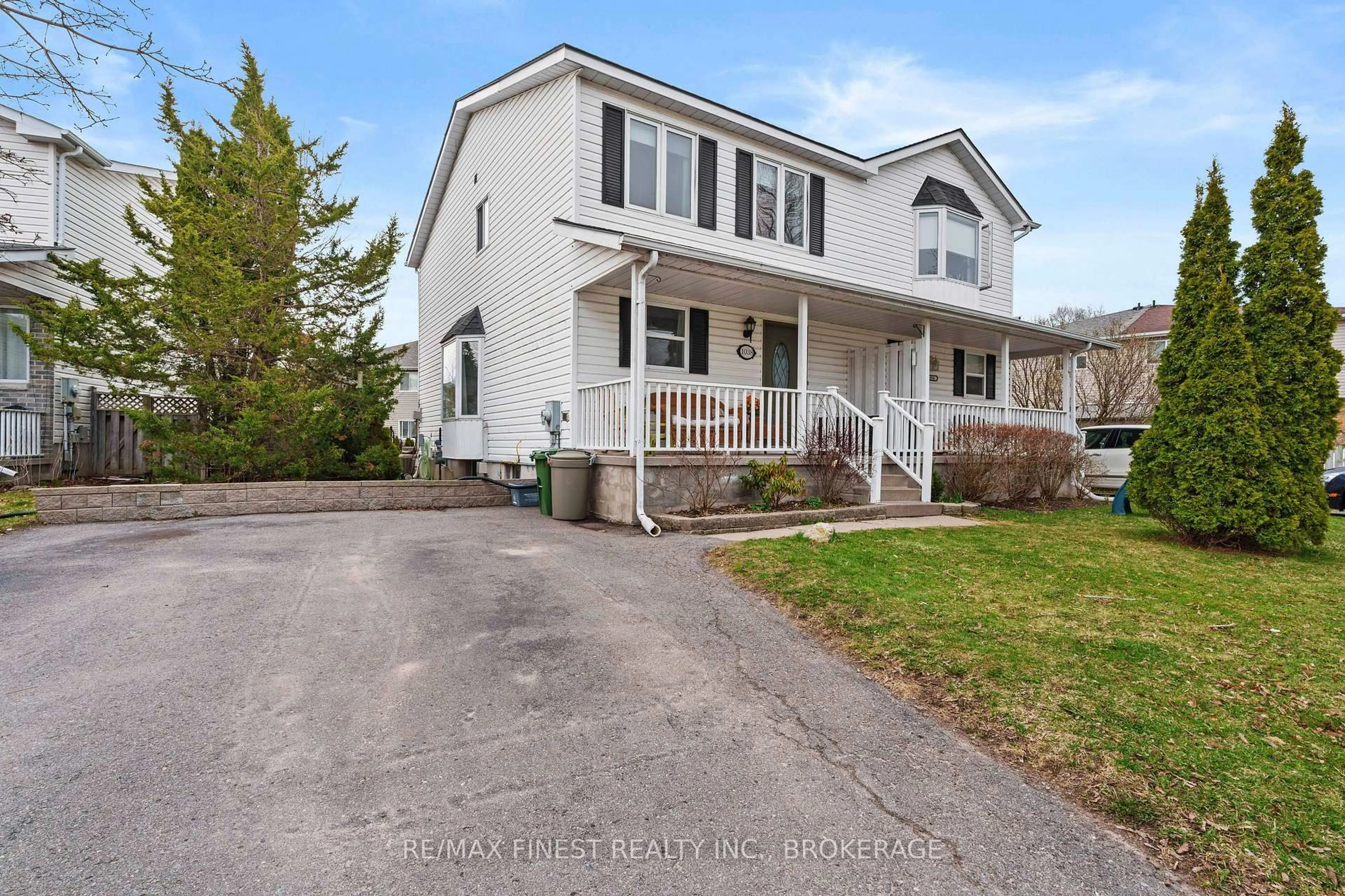 Home with vinyl exterior material, street for 1038 Springfield Dr, Kingston Ontario K7M 8V6