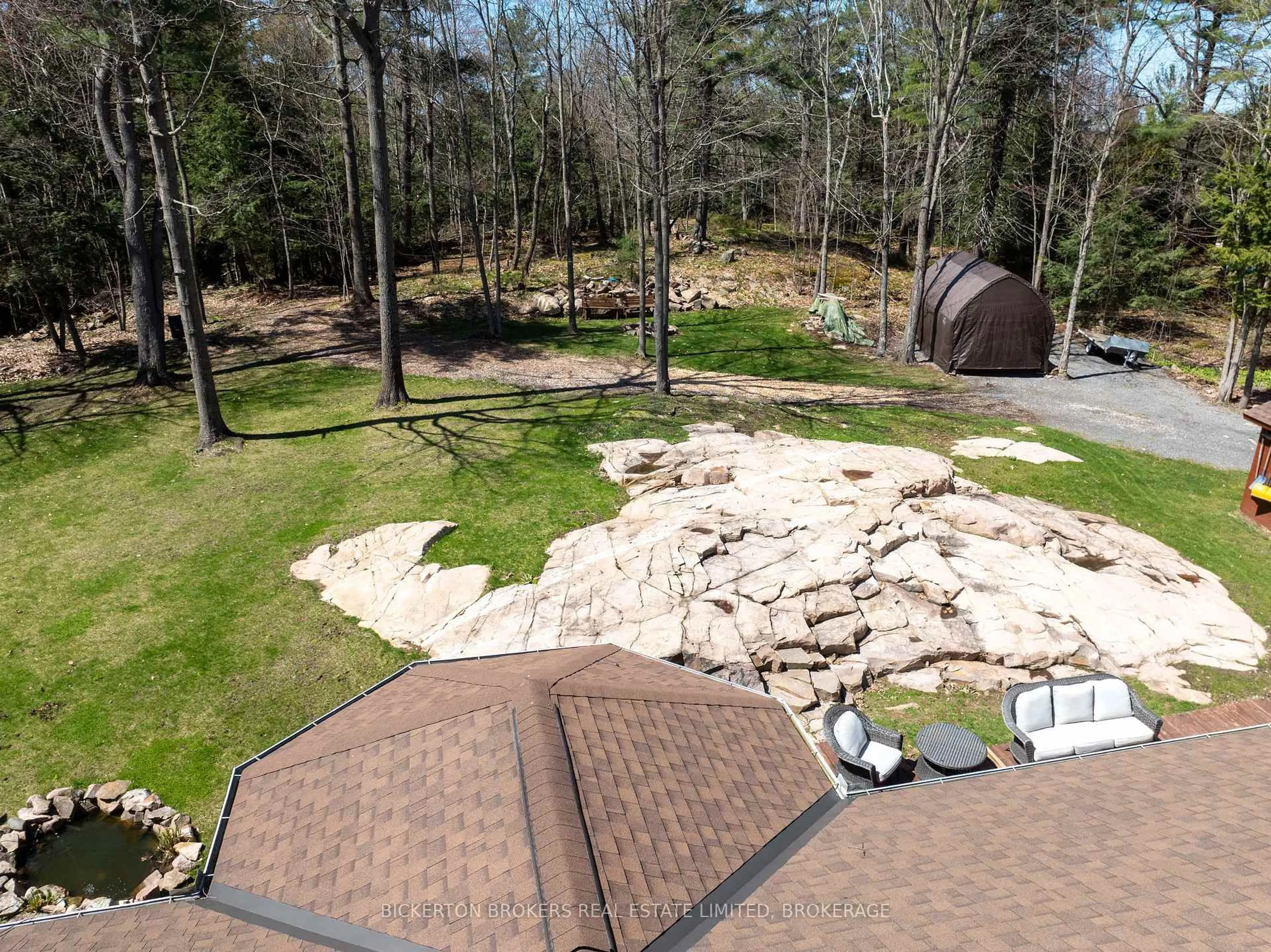 A pic from outside/outdoor area/front of a property/back of a property/a pic from drone, forest/trees view for 43 Village Estate Rd, Lansdowne Ontario K0E 1L0