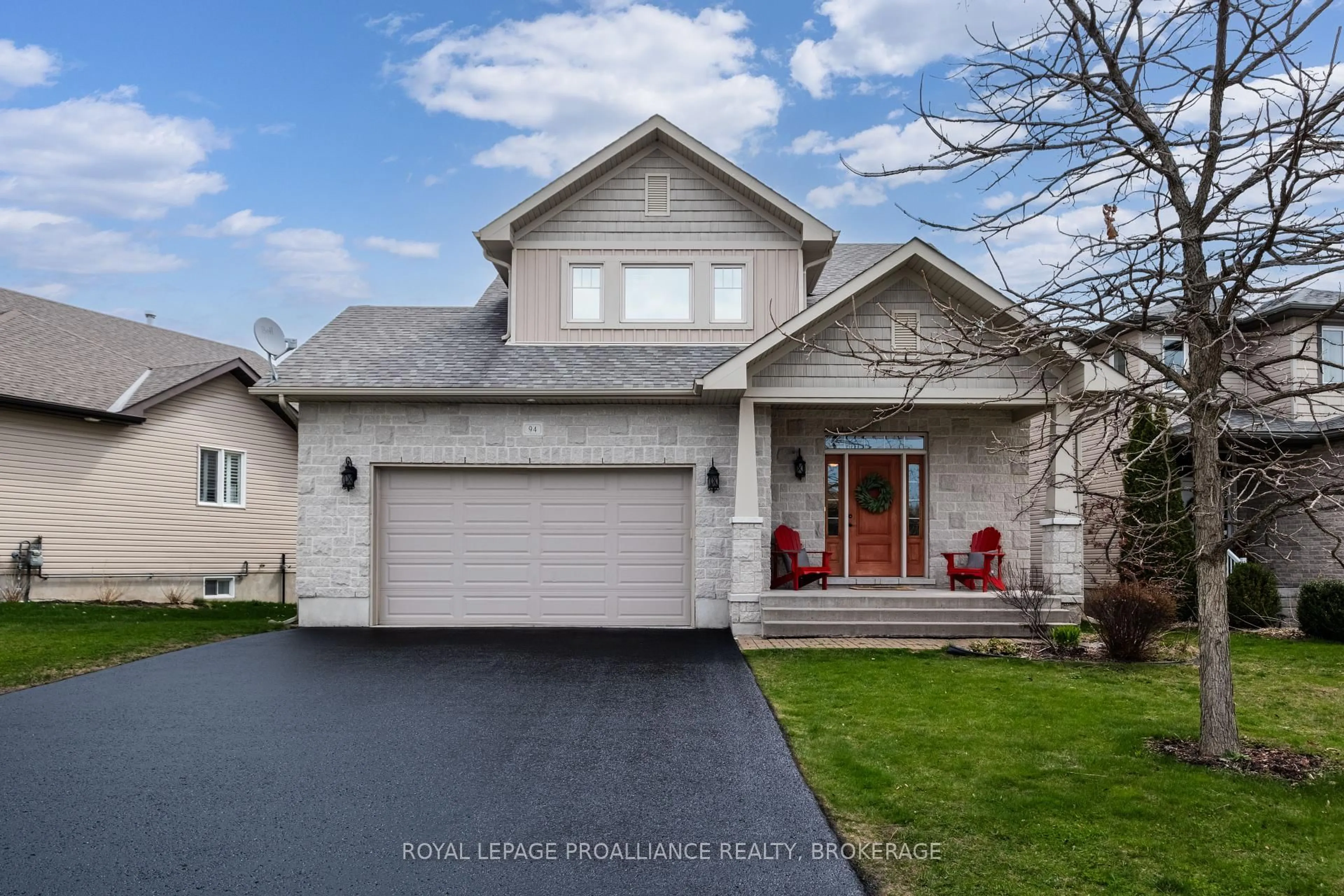 Home with vinyl exterior material, street for 94 Windermere Blvd, Bath Ontario K0H 1G0
