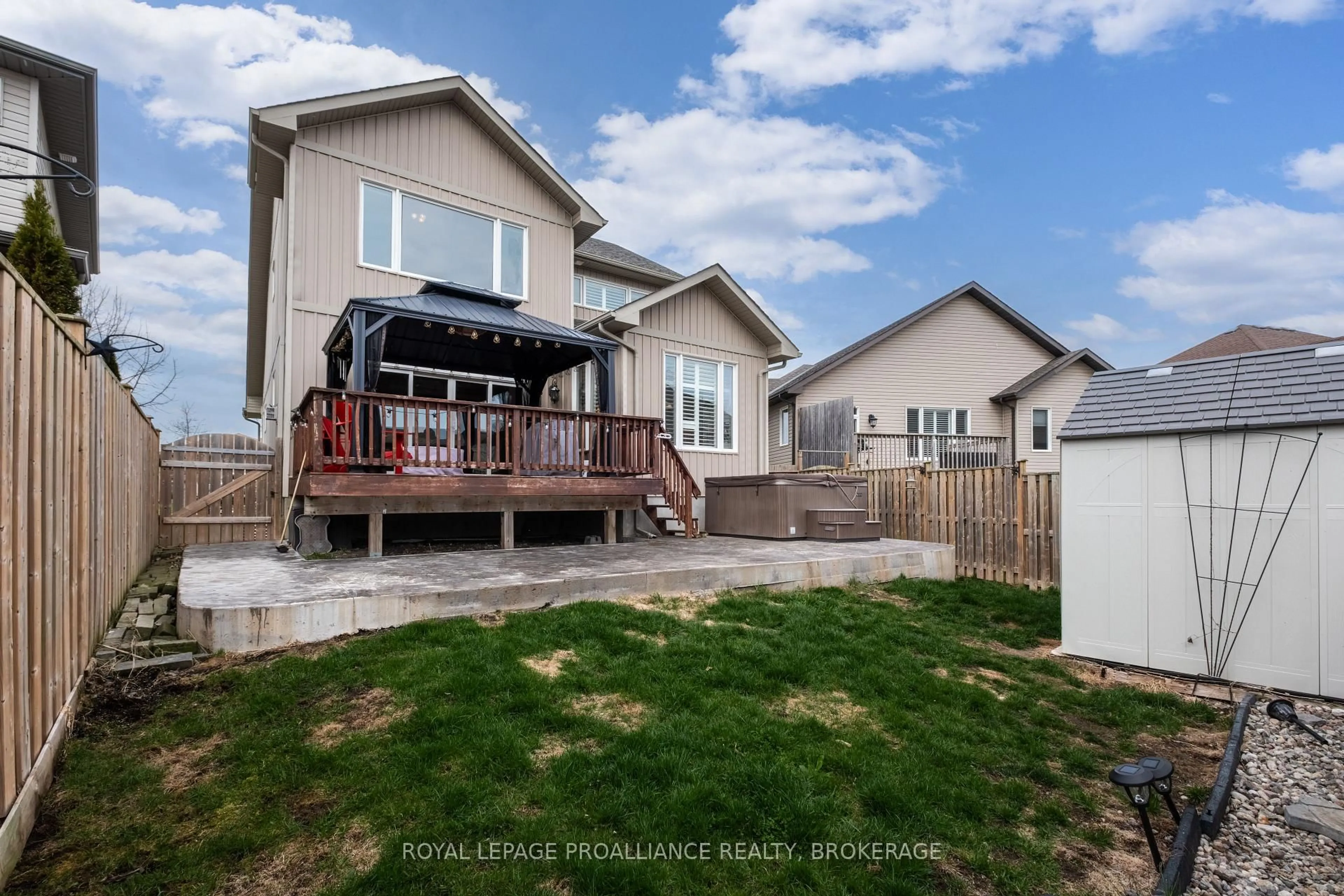 Home with vinyl exterior material, street for 94 Windermere Blvd, Bath Ontario K0H 1G0