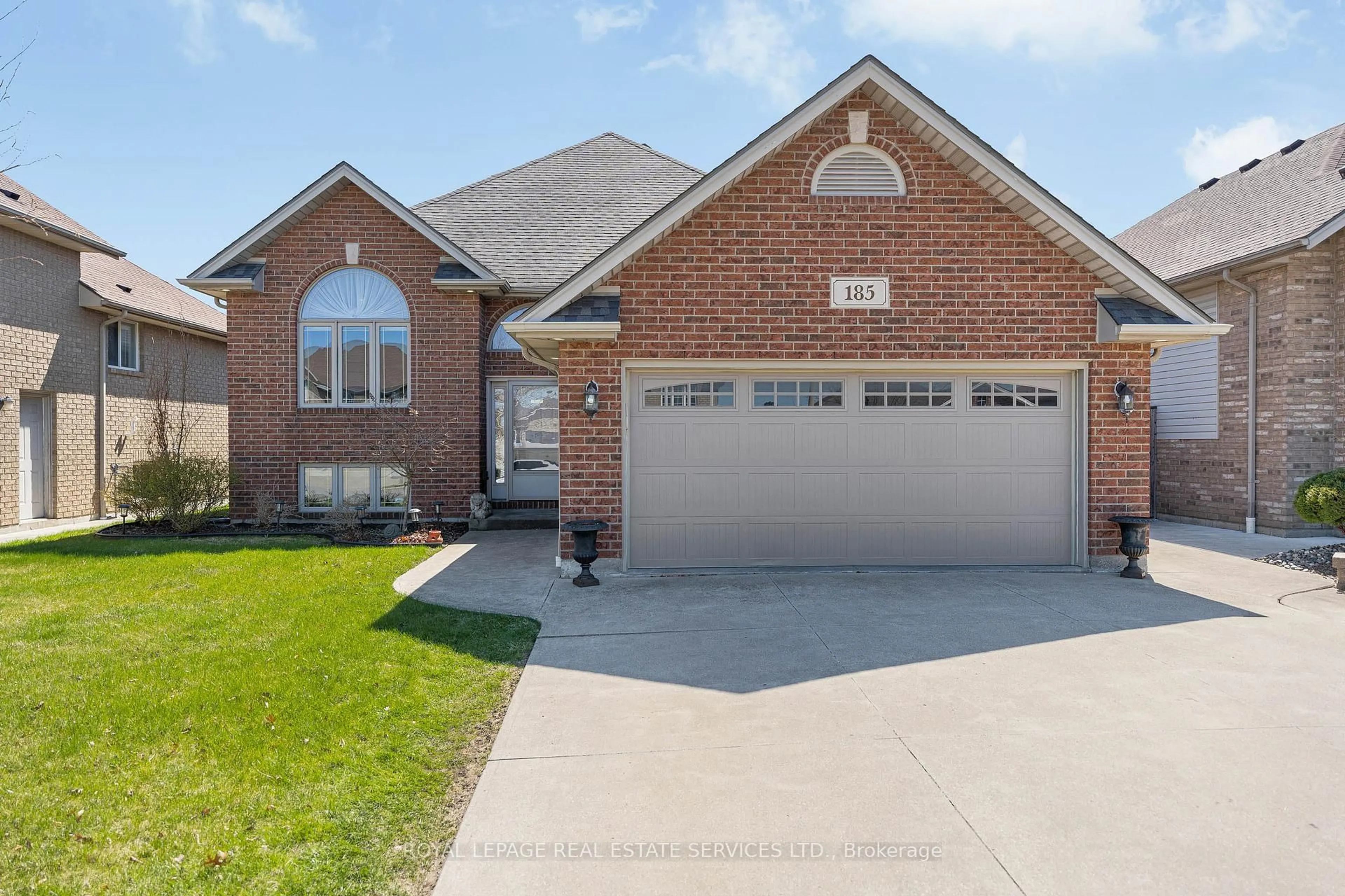 Home with brick exterior material, street for 185 Amy Croft Dr, Lakeshore Ontario N9K 1E3