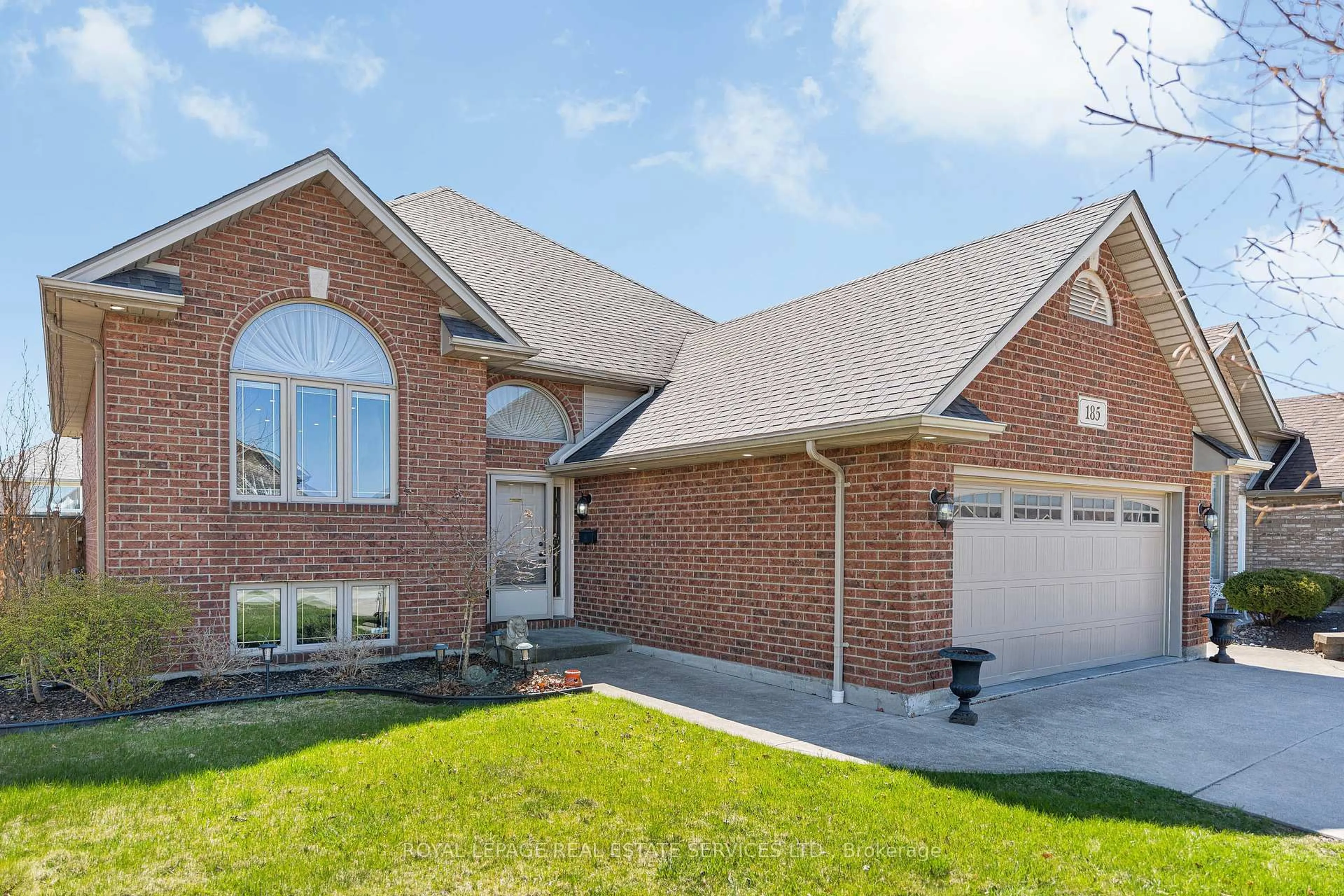 Home with brick exterior material, street for 185 Amy Croft Dr, Lakeshore Ontario N9K 1E3