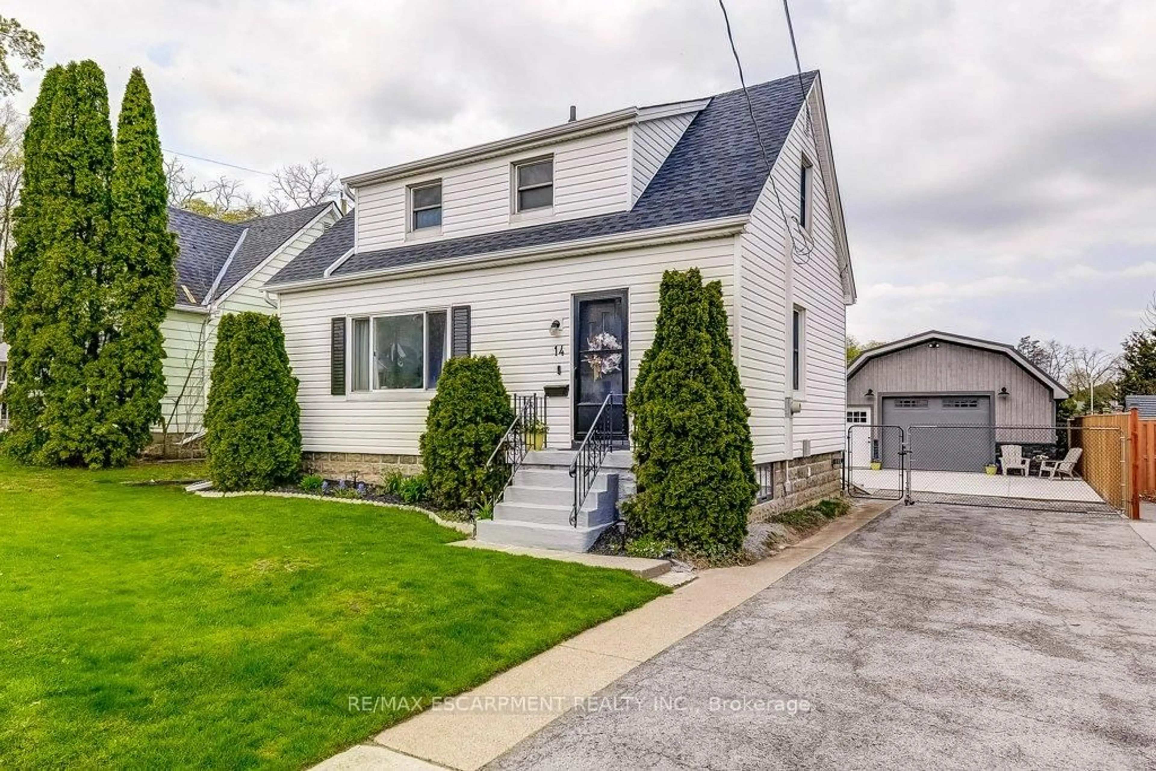 Home with vinyl exterior material, street for 14 WALKER Ave, Hamilton Ontario L8G 1S6