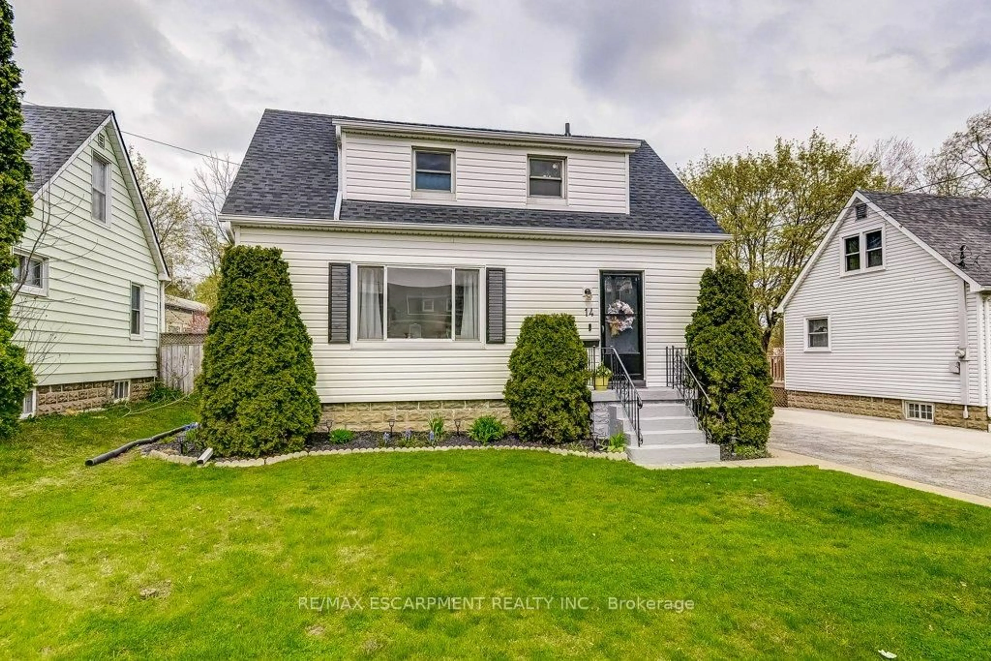 Home with vinyl exterior material, street for 14 WALKER Ave, Hamilton Ontario L8G 1S6