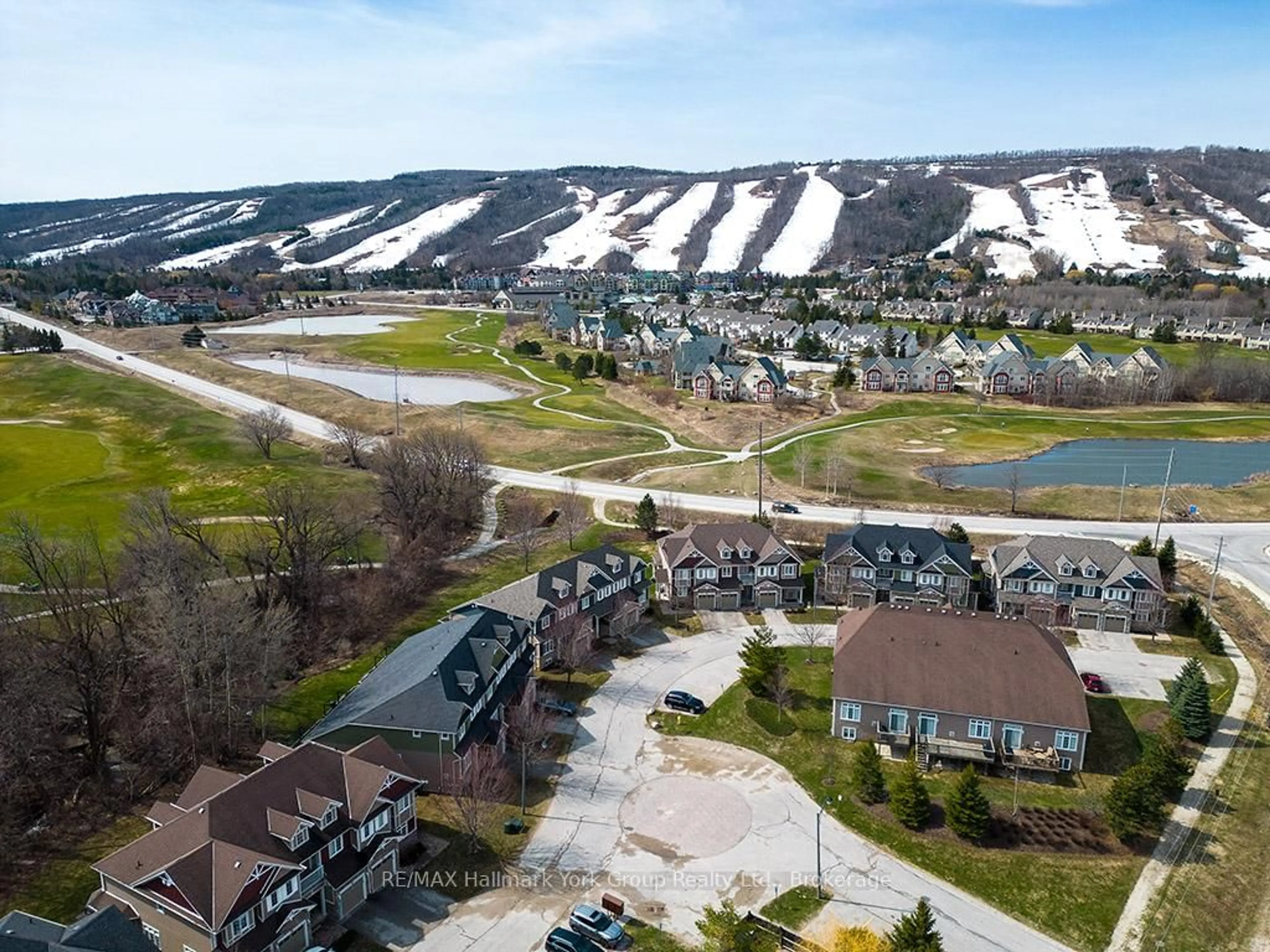 A pic from outside/outdoor area/front of a property/back of a property/a pic from drone, mountain view for 689616 Monterra Rd #18, Blue Mountains Ontario L9Y 0W3