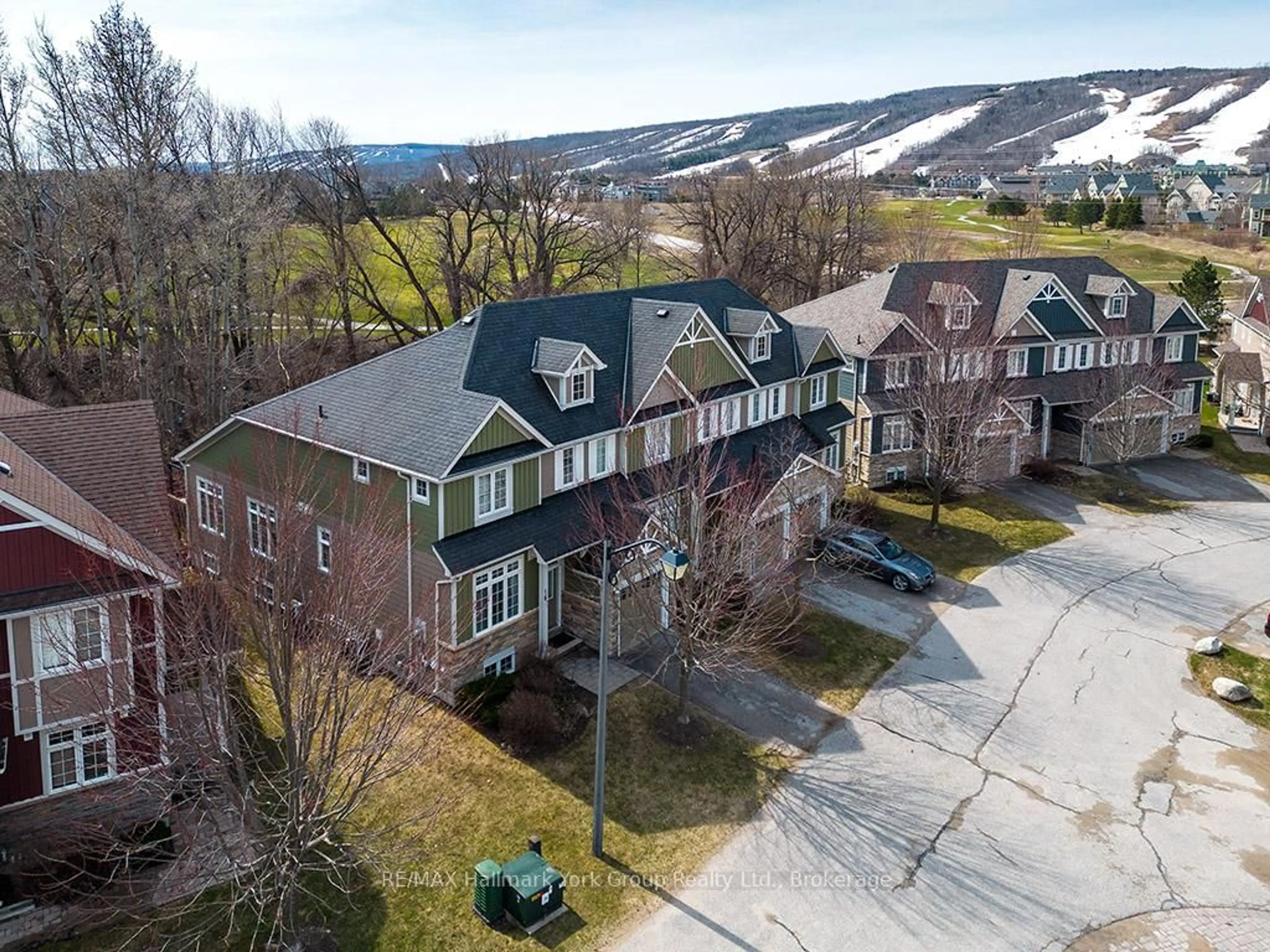 A pic from outside/outdoor area/front of a property/back of a property/a pic from drone, mountain view for 689616 Monterra Rd #18, Blue Mountains Ontario L9Y 0W3