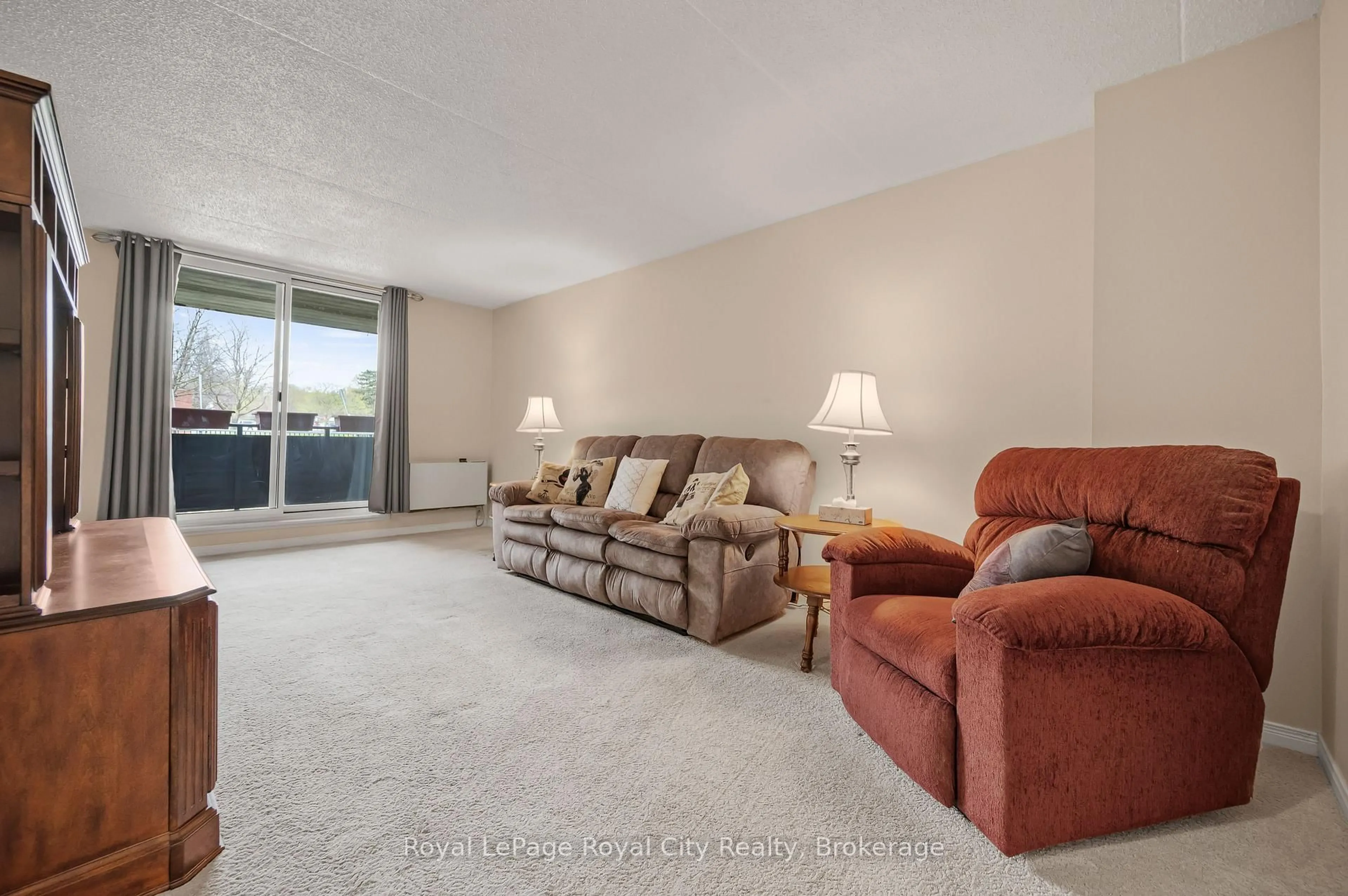 Living room with furniture, unknown for 75 Silvercreek Pkwy #208, Guelph Ontario N1H 7R9