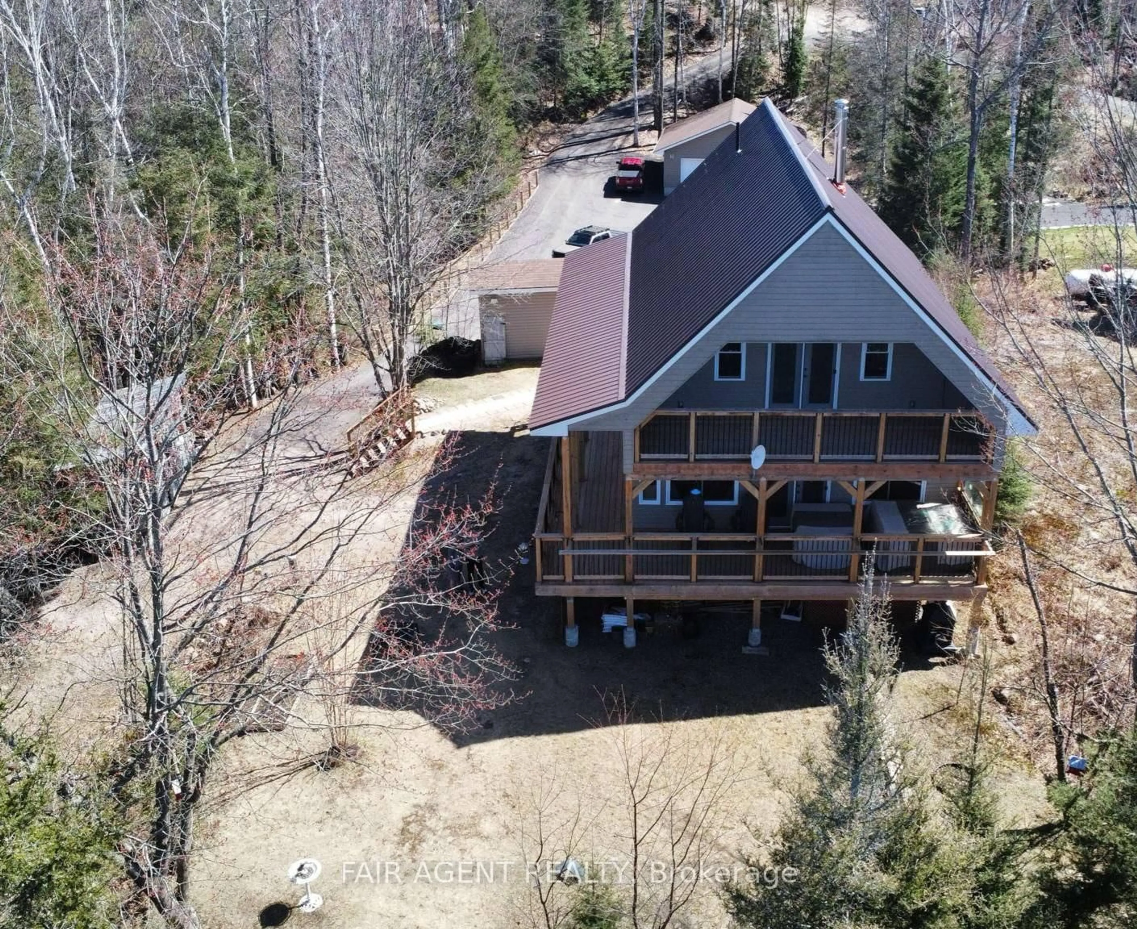 A pic from outside/outdoor area/front of a property/back of a property/a pic from drone, water/lake/river/ocean view for 126 PARGETER Rd, East Ferris Ontario P0H 1B0