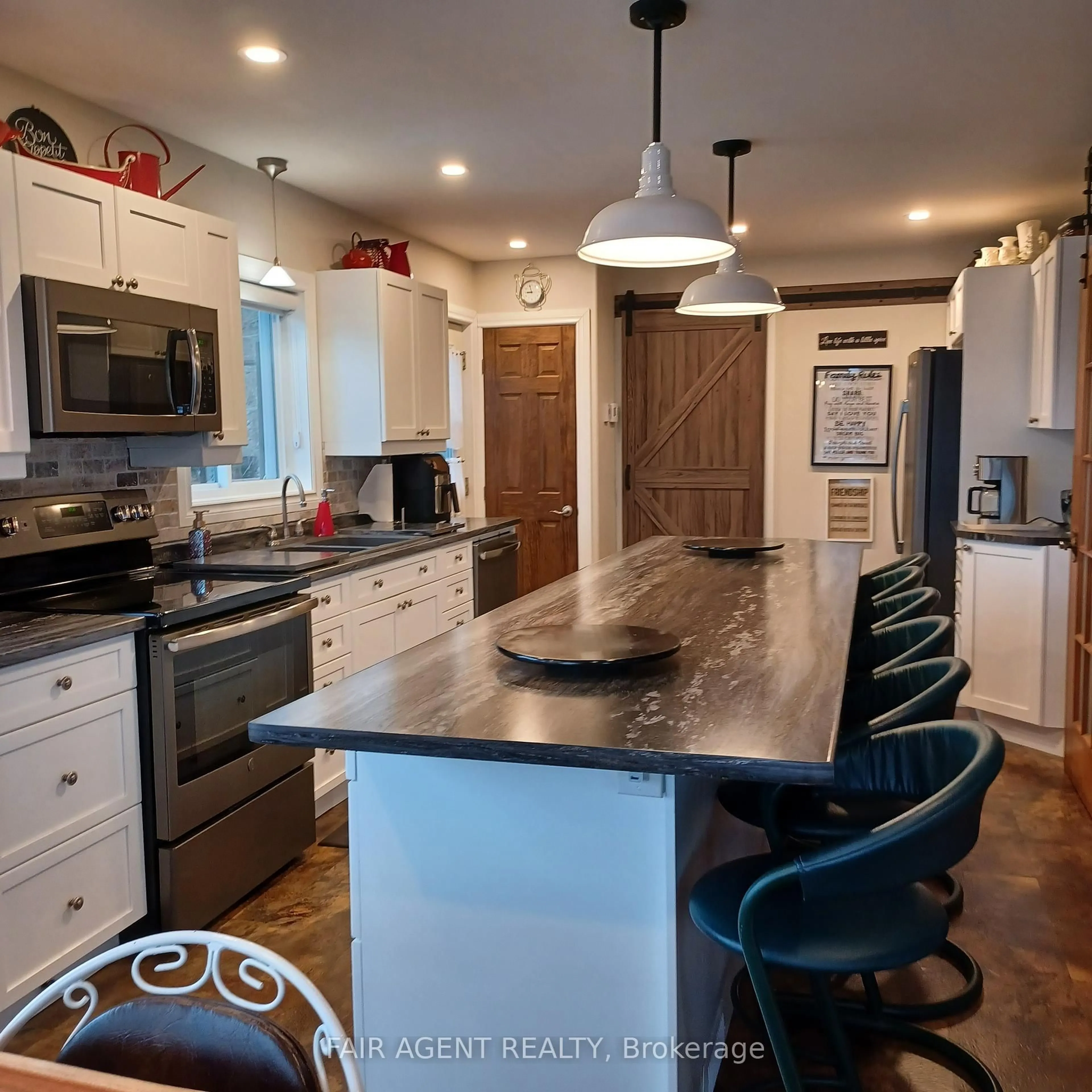 Open concept kitchen, ceramic/tile floor for 126 PARGETER Rd, East Ferris Ontario P0H 1B0