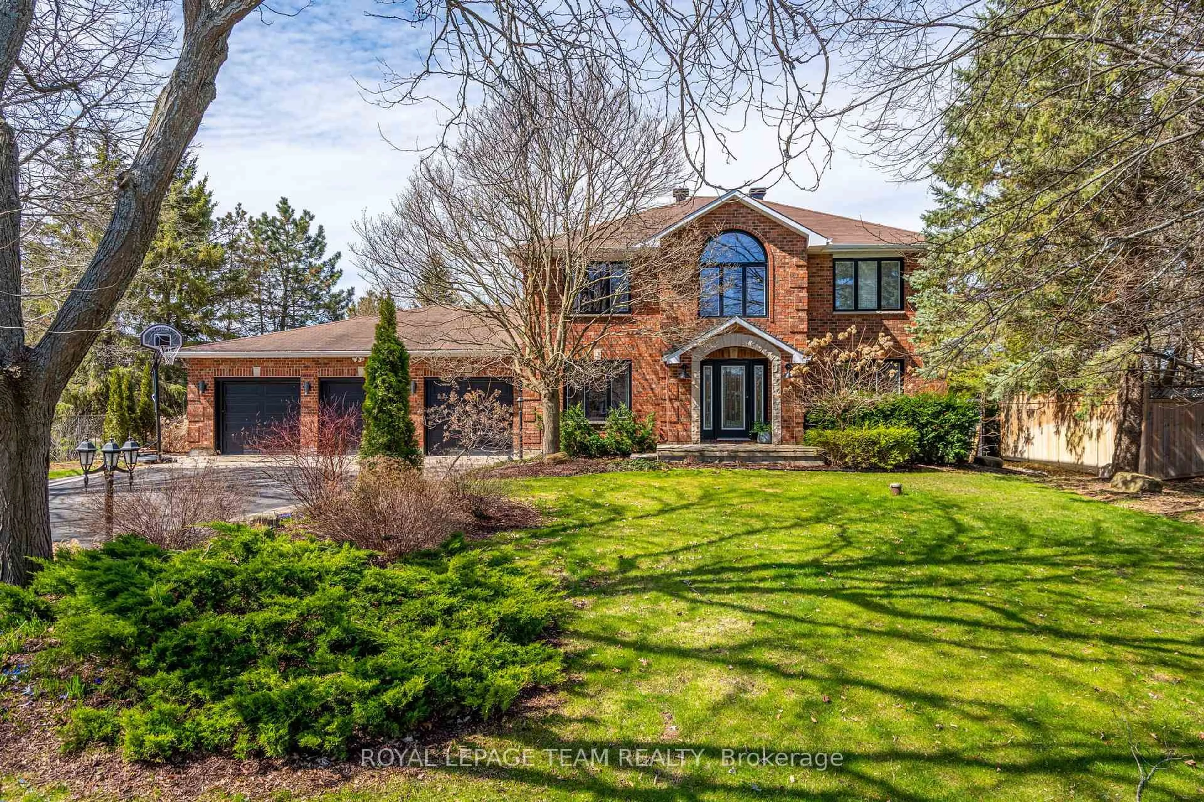 Home with brick exterior material, street for 1317 Revell Dr, Manotick Ontario K4M 1K8