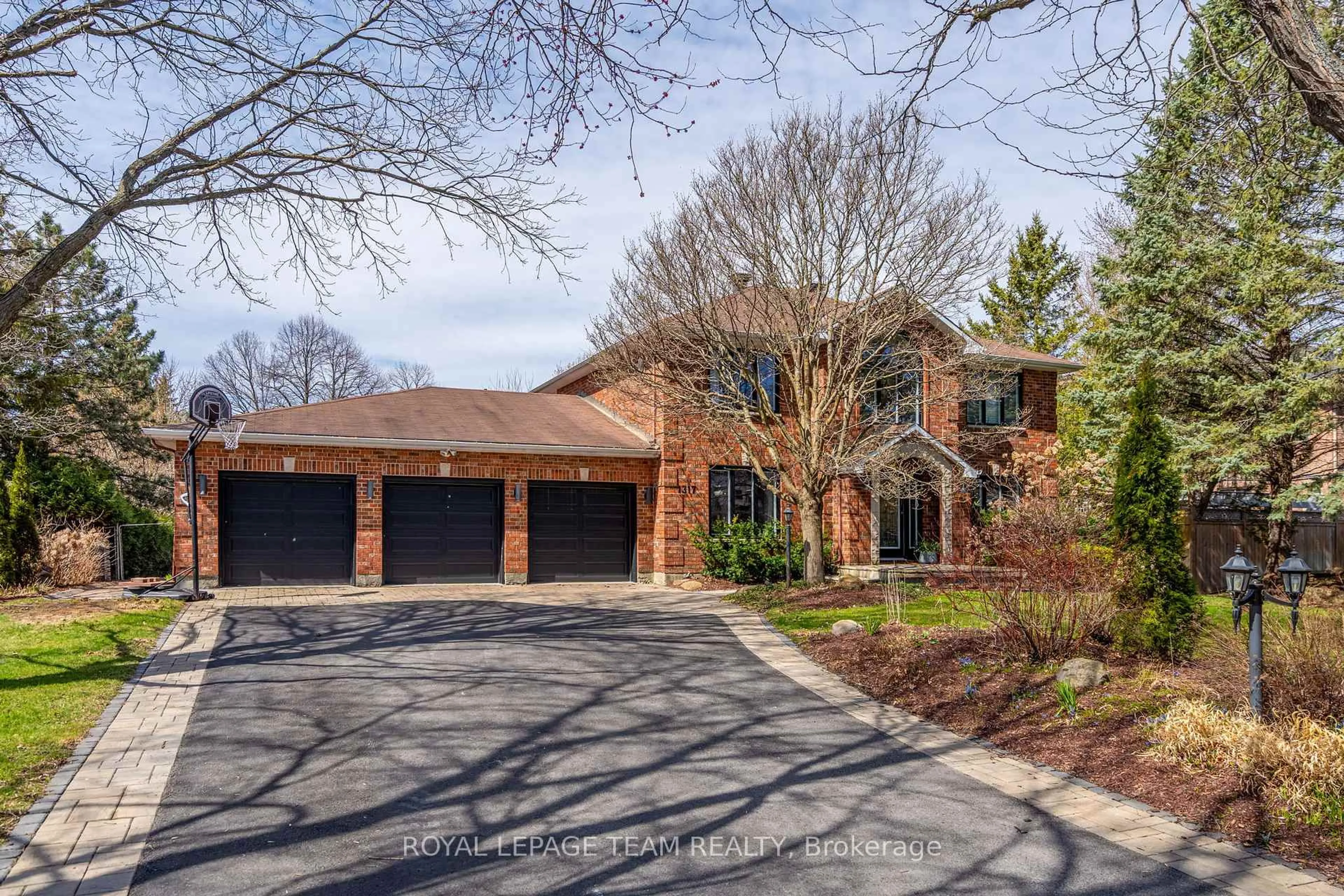 Home with brick exterior material, street for 1317 Revell Dr, Manotick Ontario K4M 1K8