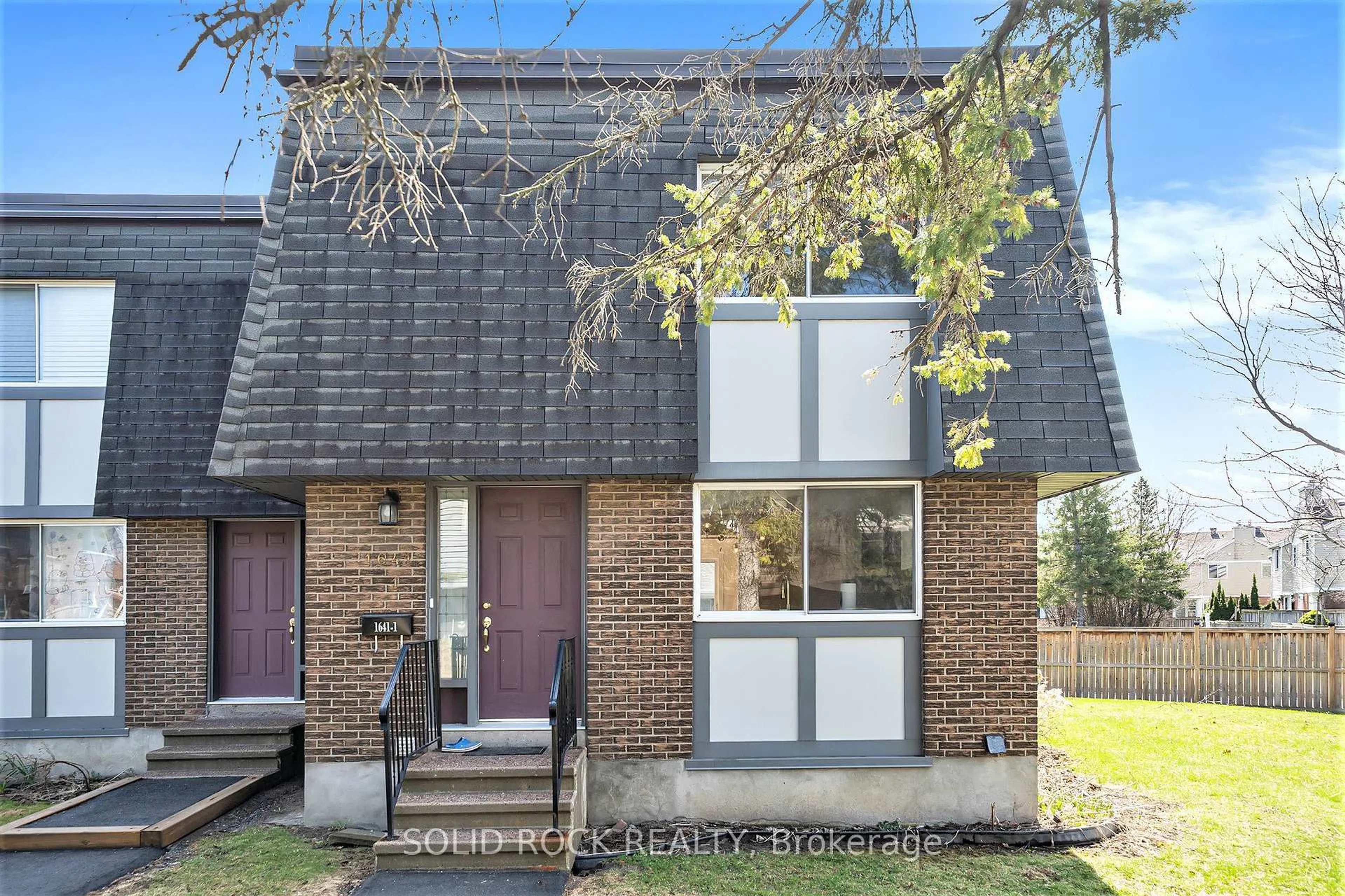 Home with brick exterior material, street for 1641 Heatherington Rd #1, Ottawa Ontario K1V 8V8