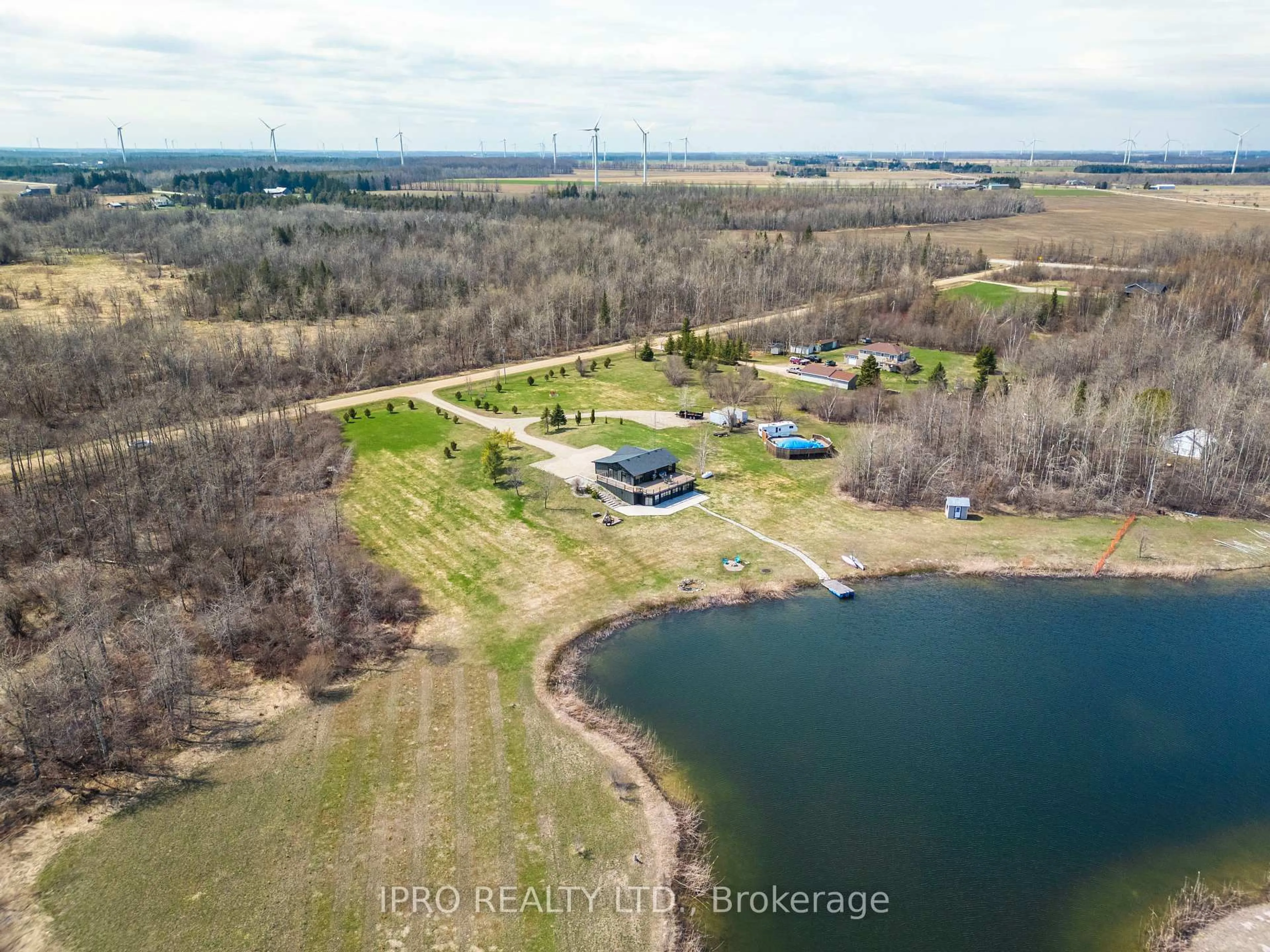 A pic from outside/outdoor area/front of a property/back of a property/a pic from drone, water/lake/river/ocean view for 375721 6th Line, Amaranth Ontario L9V 1K9