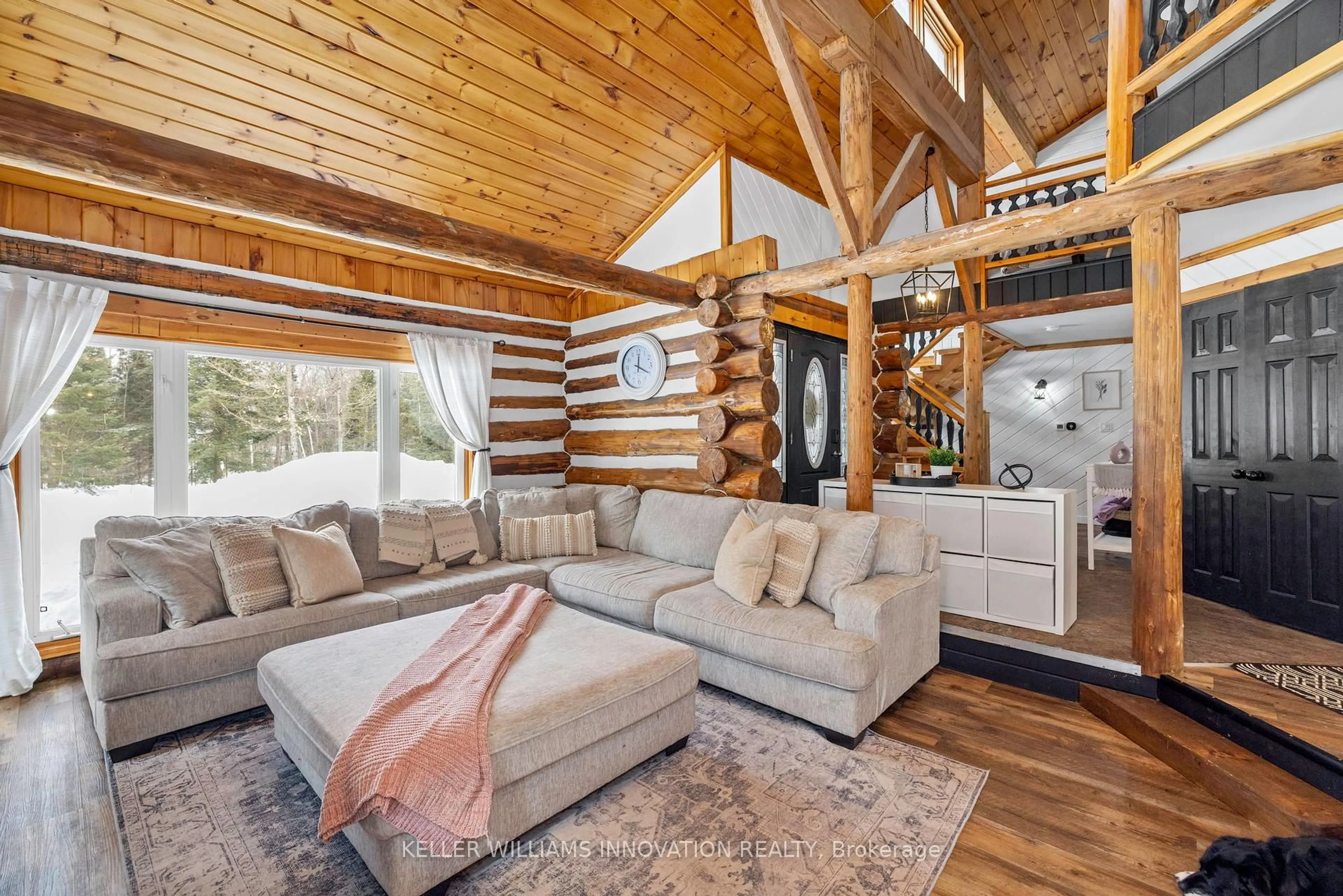 Living room with furniture, wood/laminate floor for 239 Old Government Rd, Perry Ontario P0A 1J0