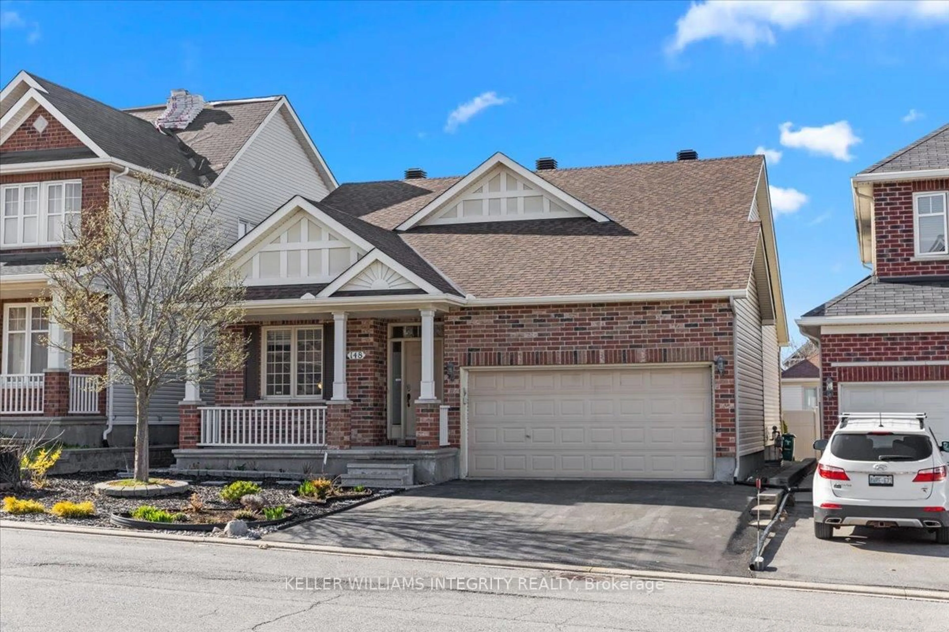 Home with brick exterior material, street for 148 Rodeo Dr, Ottawa Ontario K2J 5K7
