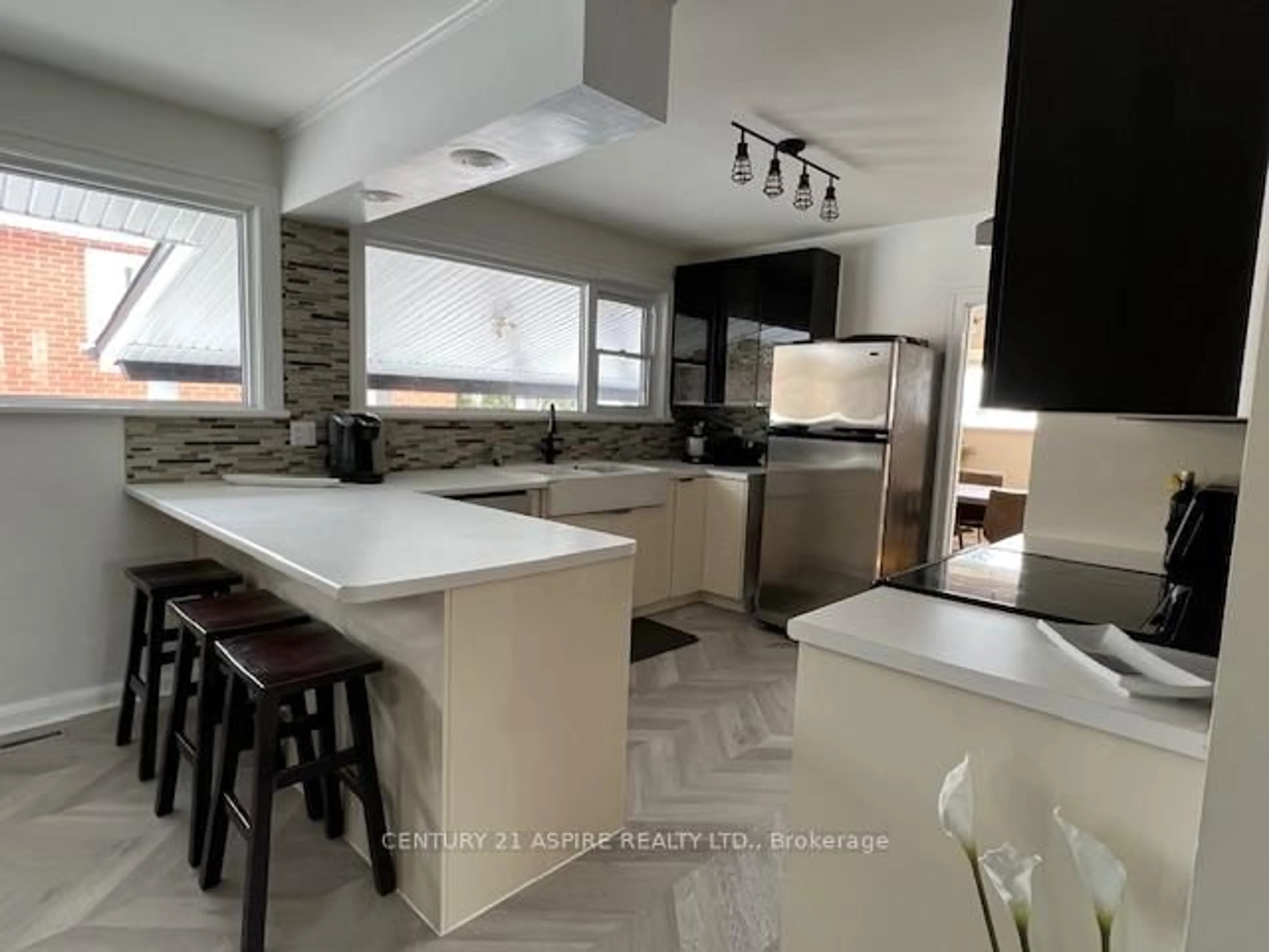 Open concept kitchen, ceramic/tile floor for 249 Peter St, Pembroke Ontario K8A 1R1