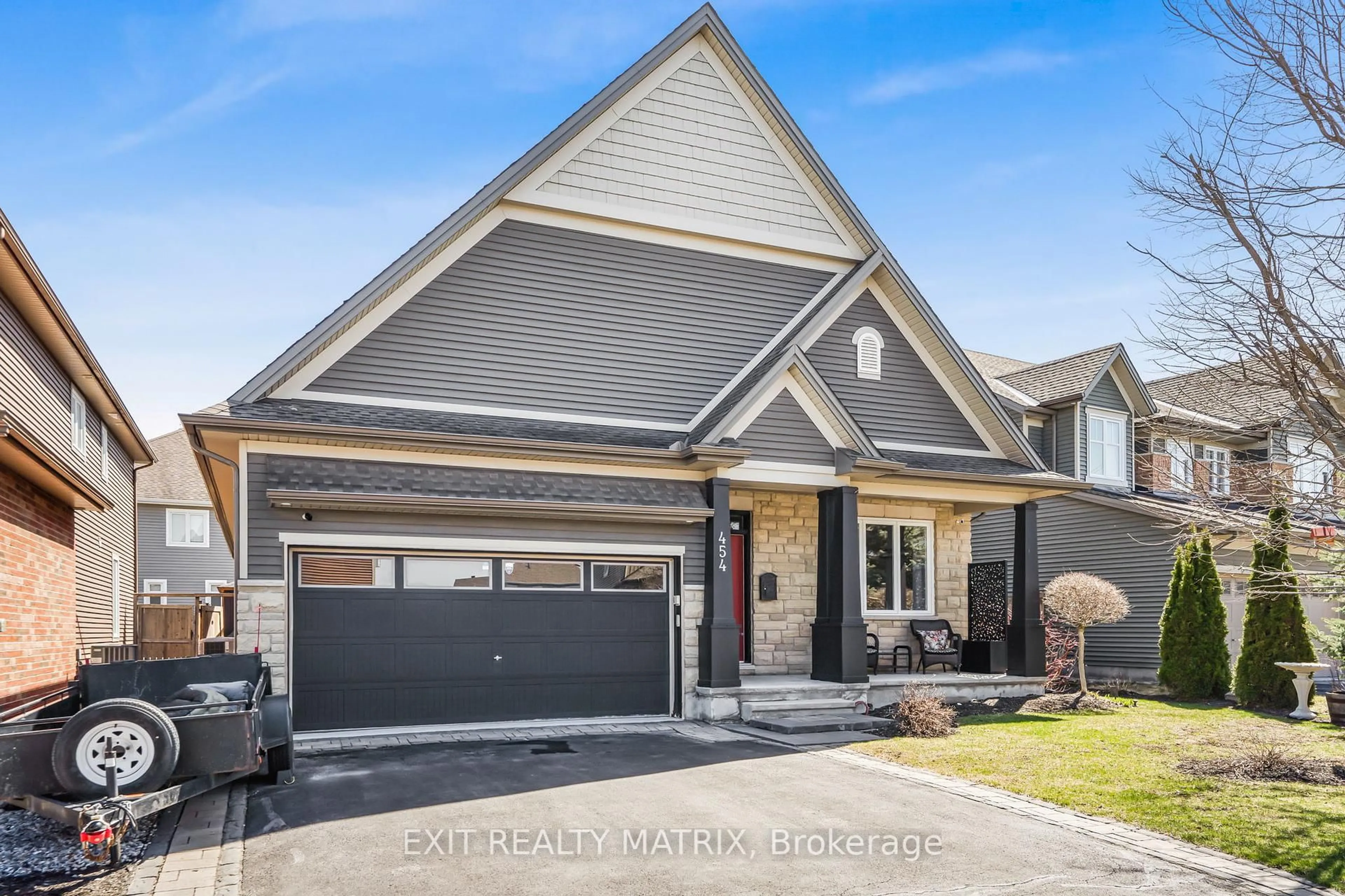 Home with brick exterior material, street for 454 Creekview Way, Ottawa Ontario K1T 0J5