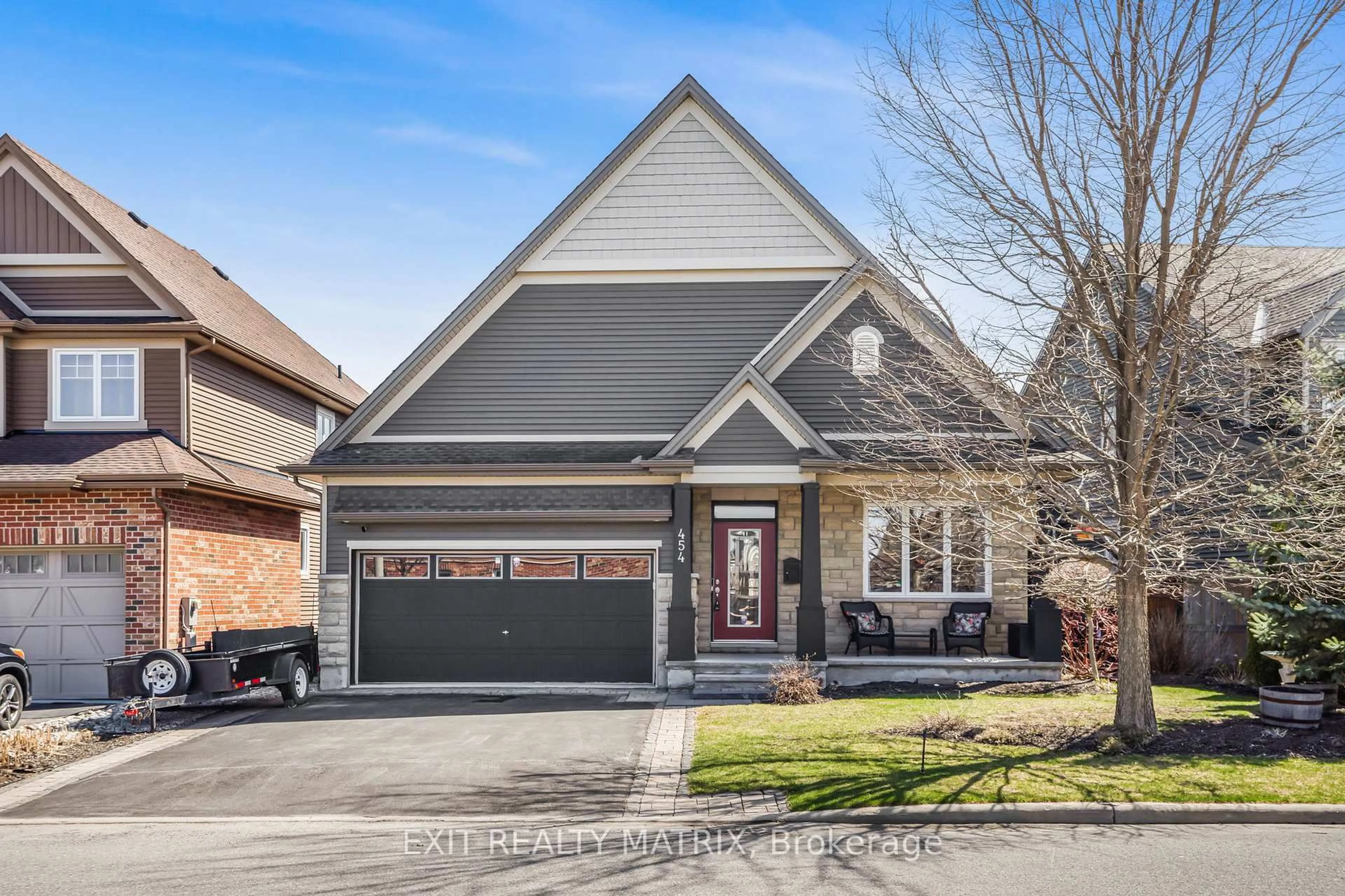 Home with brick exterior material, street for 454 Creekview Way, Ottawa Ontario K1T 0J5